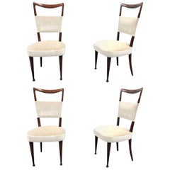 Newly Upholstered Set of Four Osvaldo Borsani Rosewood and Velvet Dining Chairs