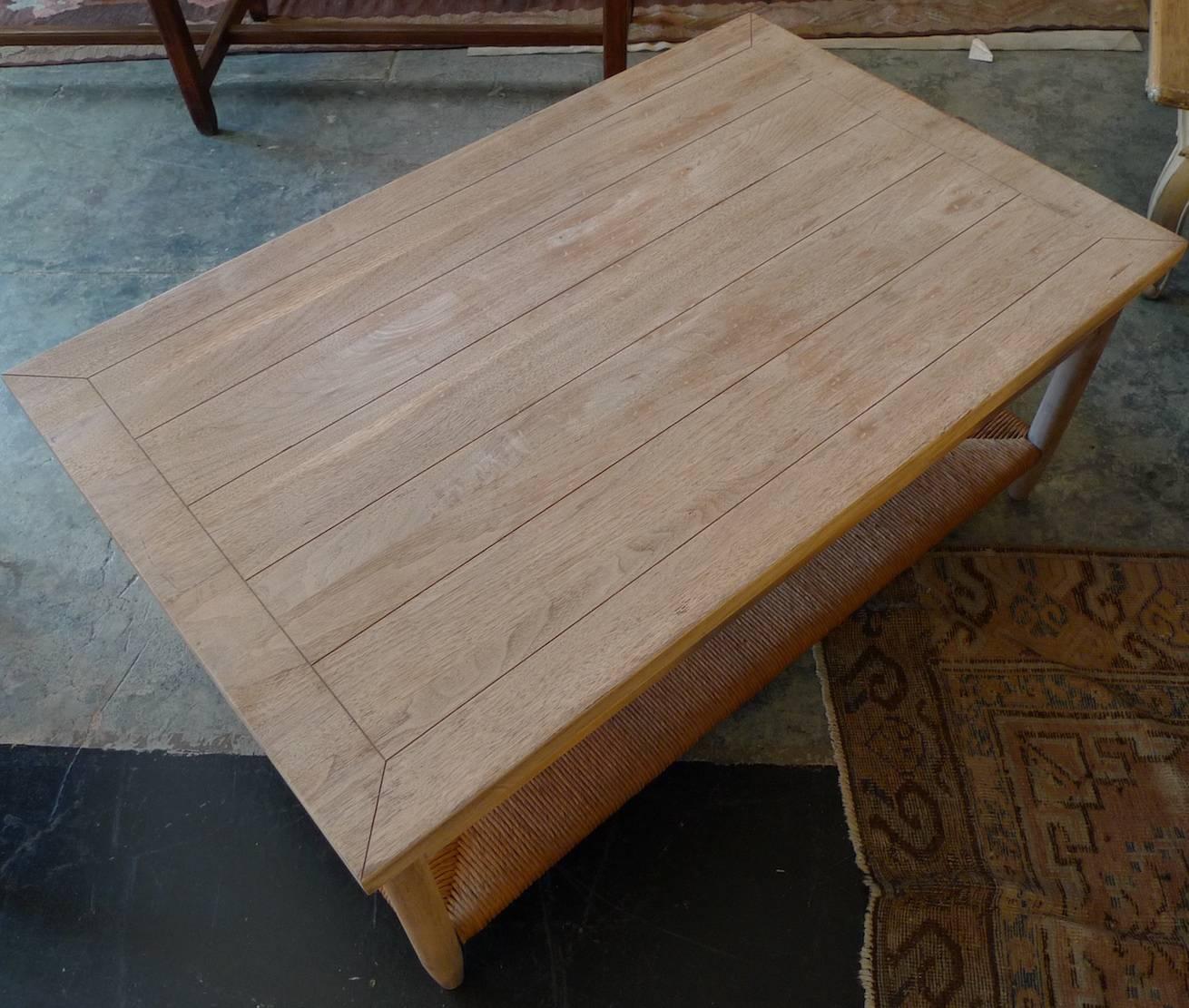 Newport 1980s style wood coffee table with rush shelf.