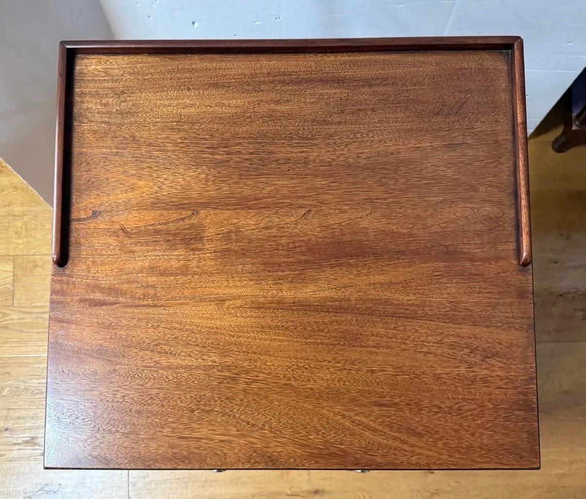 Ethan Allen Newport multi-purpose bar cart or side/end table that features rich, hand-rubbed mahogany finish that highlights the natural beauty of the wood grain.  Features two spacious drawers and makes a great bar especial for a smaller space.