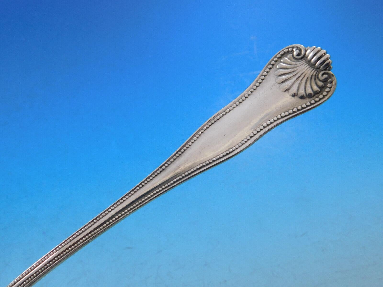 Monumental Newport shell by Frank Smith sterling silver flatware set, 101 pieces. This pattern was introduced in the year 1910 and features a shell motif with a beaded edge. This set includes:

12 dinner knives, French blades, 9 3/4