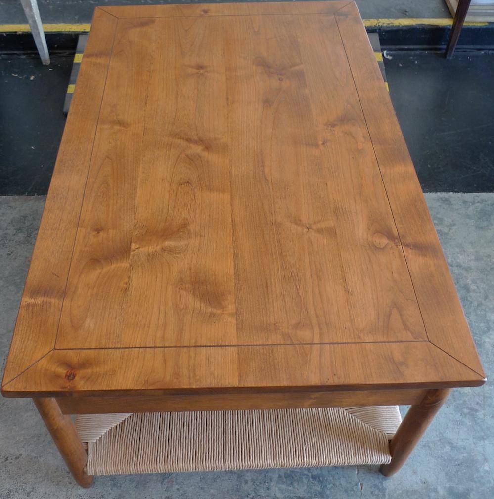 American Newport Stained Alder Coffee Table with Rush Shelf