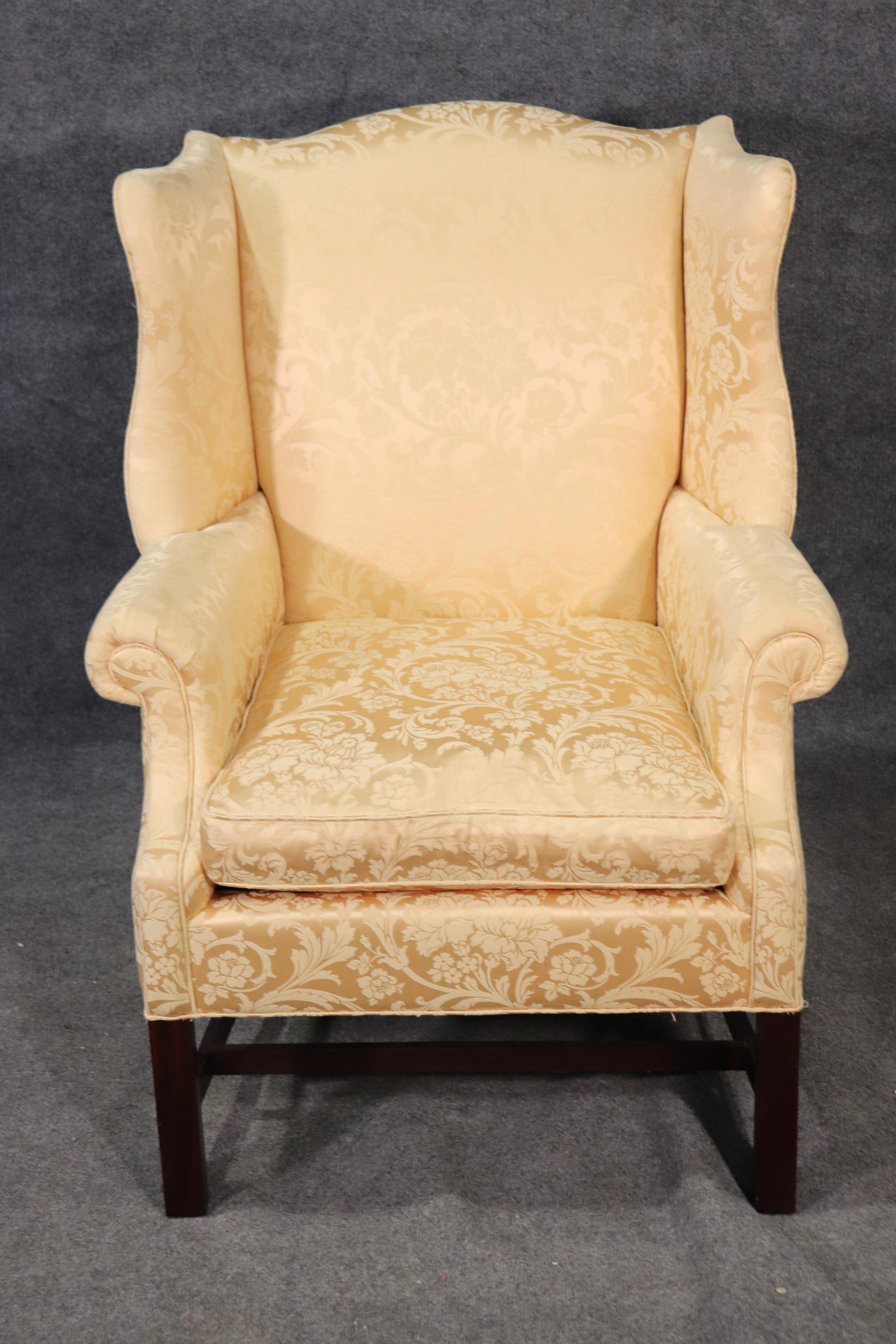 This is a nice Newport, Rhode Island style wingback chair. The chair is in good condition and measures 41 tall x 30 inches wide x 30 inches deep and the seat height is 20 inches.