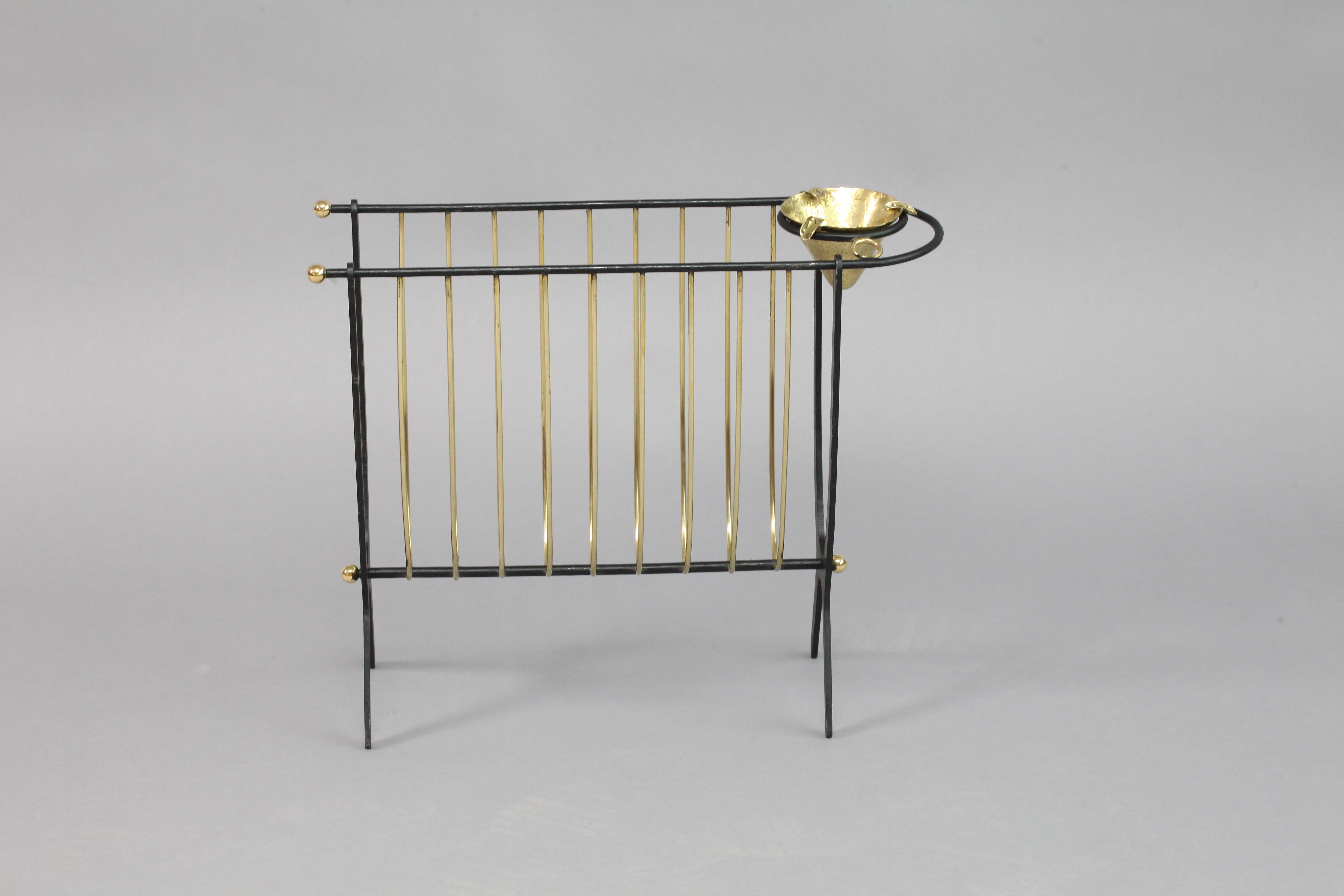 Lacquered newspaper rack with ashtray, Italy 1950. black laquered metal with brass ashtray
