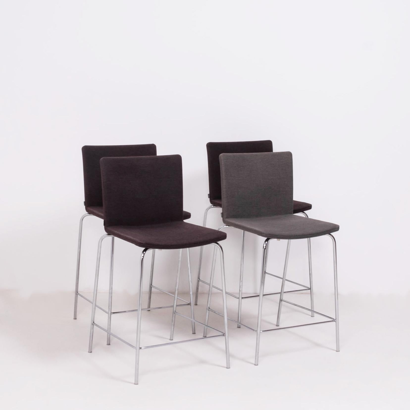 Originally designed by Mario Mazzer for Poliform in 2003, the Nex stool is the epitome of sleek and modern design.

Featuring a chromed metal frame with a foot rail, the seats are molded for comfort and are upholstered in Classic dark and light