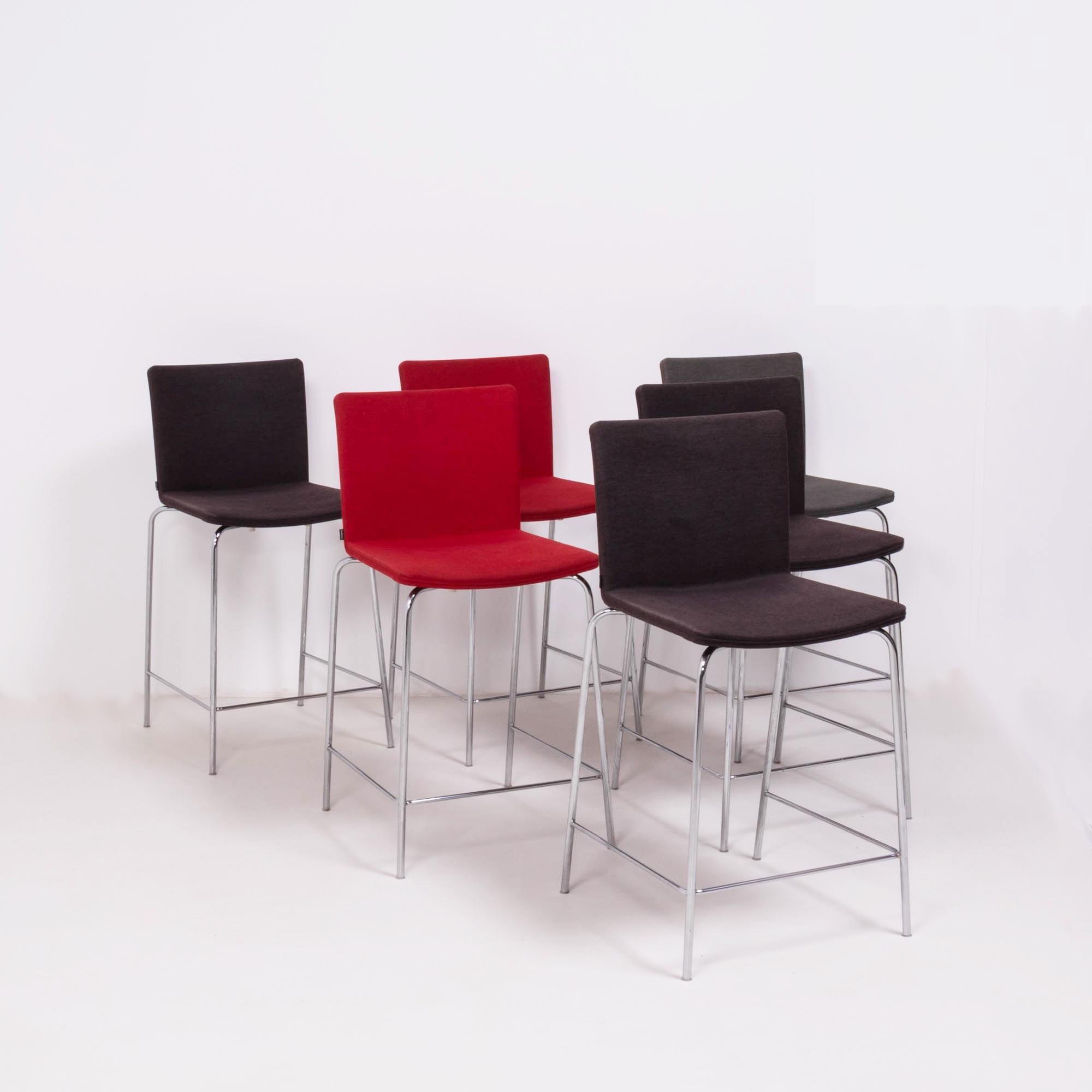 Originally designed by Mario Mazzer for Poliform in 2003, the Nex stool is the epitome of sleek and modern design.

Featuring a chromed metal frame with a foot rail, the seats are molded for comfort and are upholstered in a selection of classic