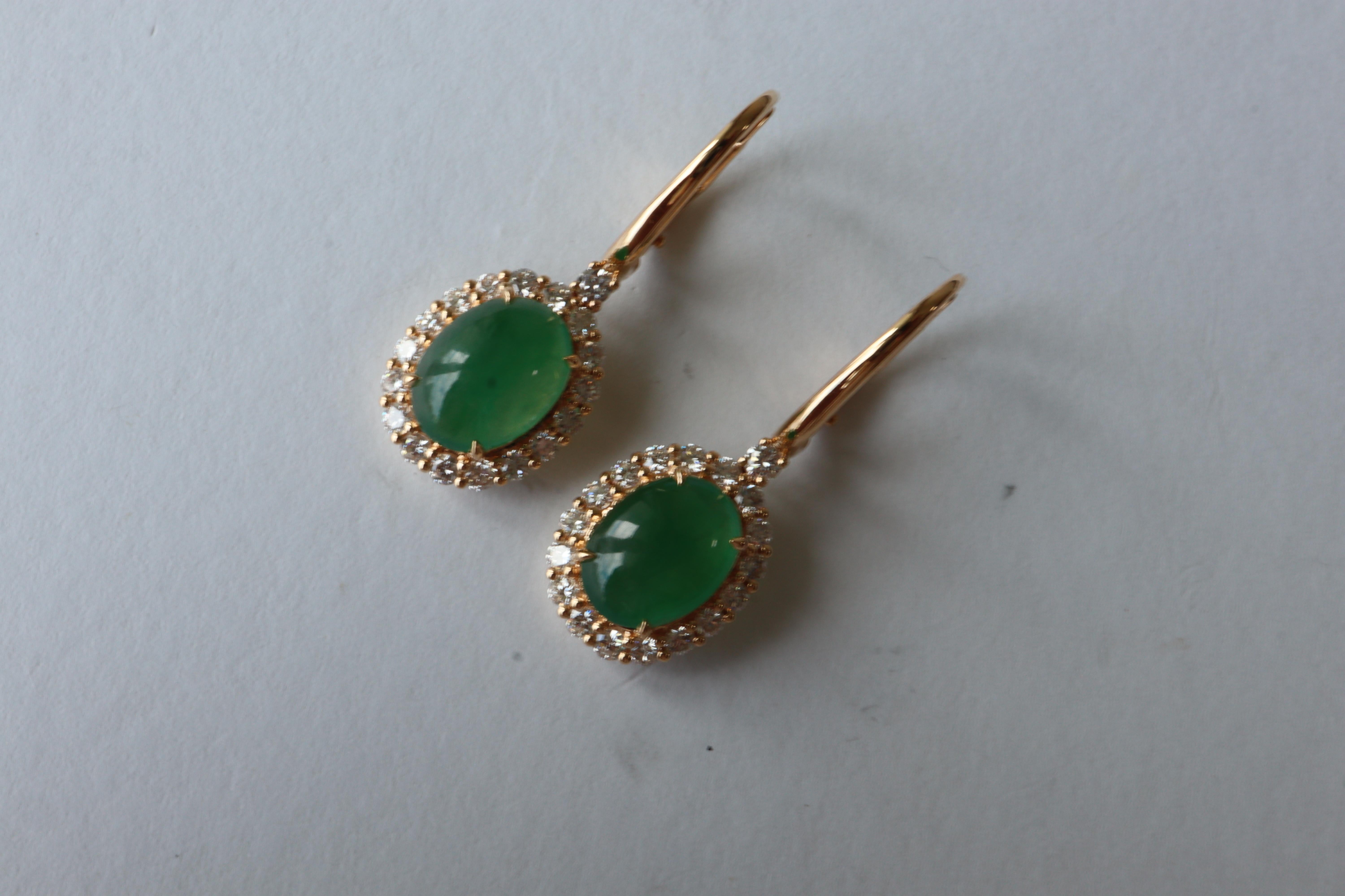 Features:

Main Gemstone (2pcs) - Burmese Type A Jade

Total Carat Weight (2pcs) - 3.45Ct

Weight of natural diamonds (36pcs) - 0.70Ct (approx)

Measurements (gemstone) - 9.2x6.9/9x6.7mm

Cut - Oval

Clarity - No Visible Inclusion (No break, No