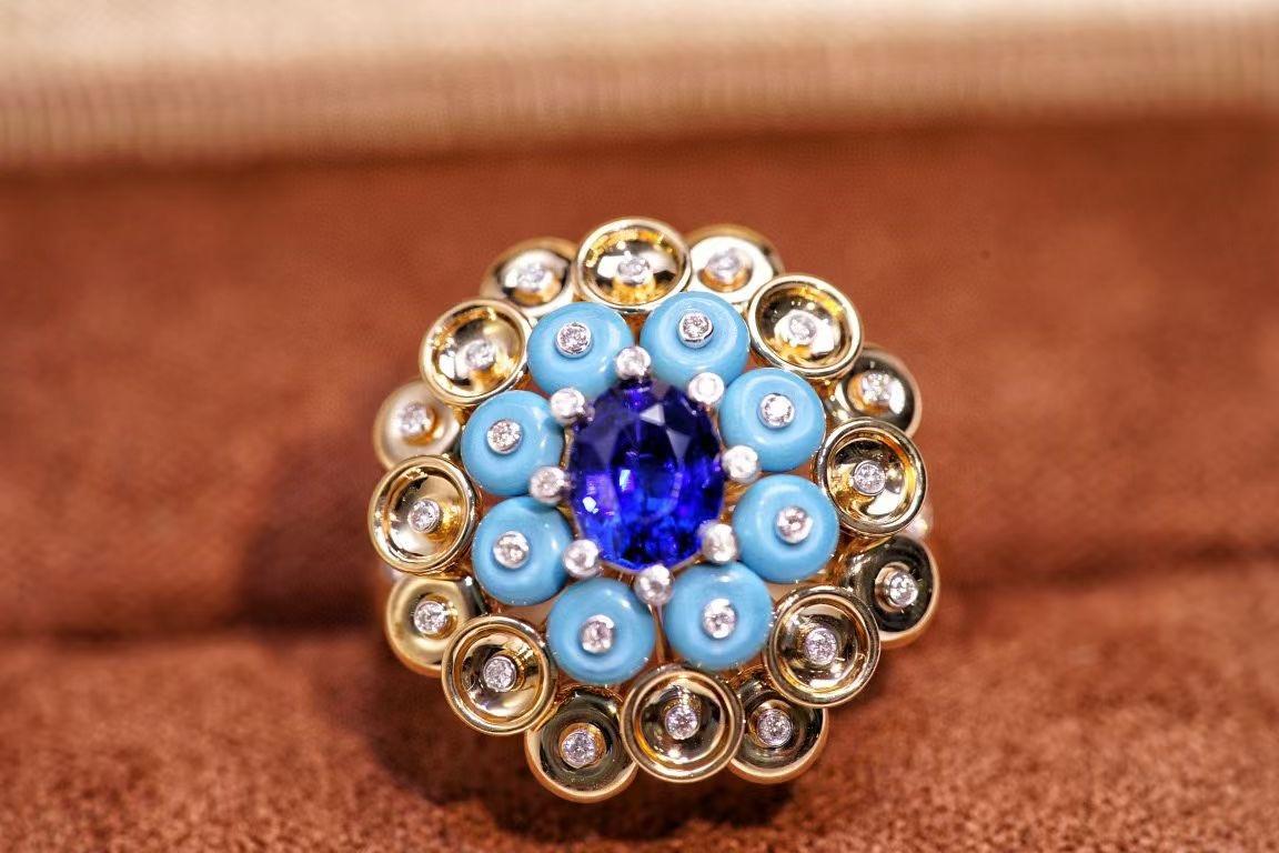 NGL Certified 18K Gold Unheated Sapphire & Turquoise Cocktail Ring with Diamonds

1 Unheated Sapphire - 1.1 CT
Diamonds & Turquoises 

NGL Certification Available