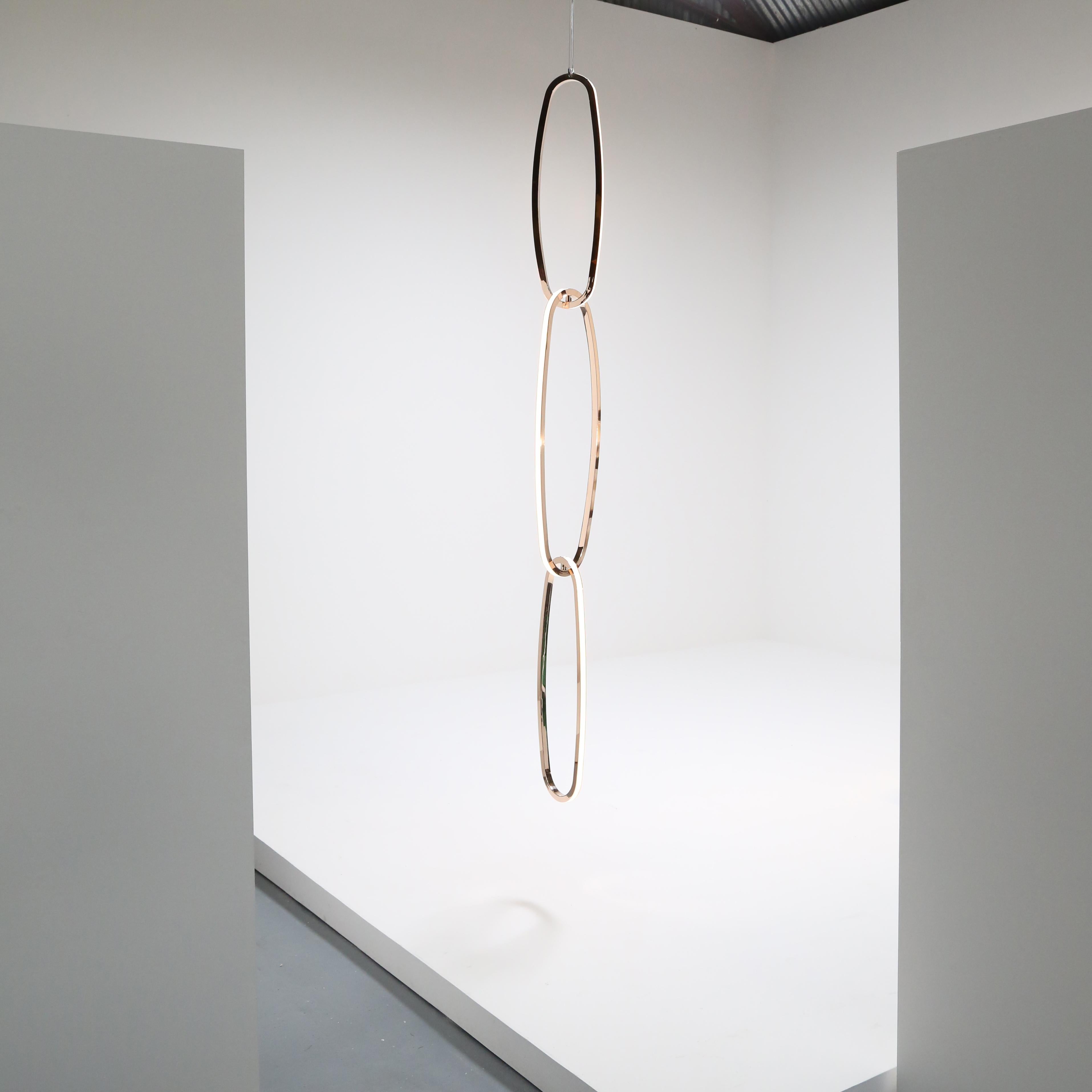 Link, true to its name, is made up of three rings of patinated and polished bronze, LEDs, and opal glass tiles. This piece stands out amidst Barry's other sculptures, unique for its simplicity of arrangement, and relative symmetry. 

Medium:
