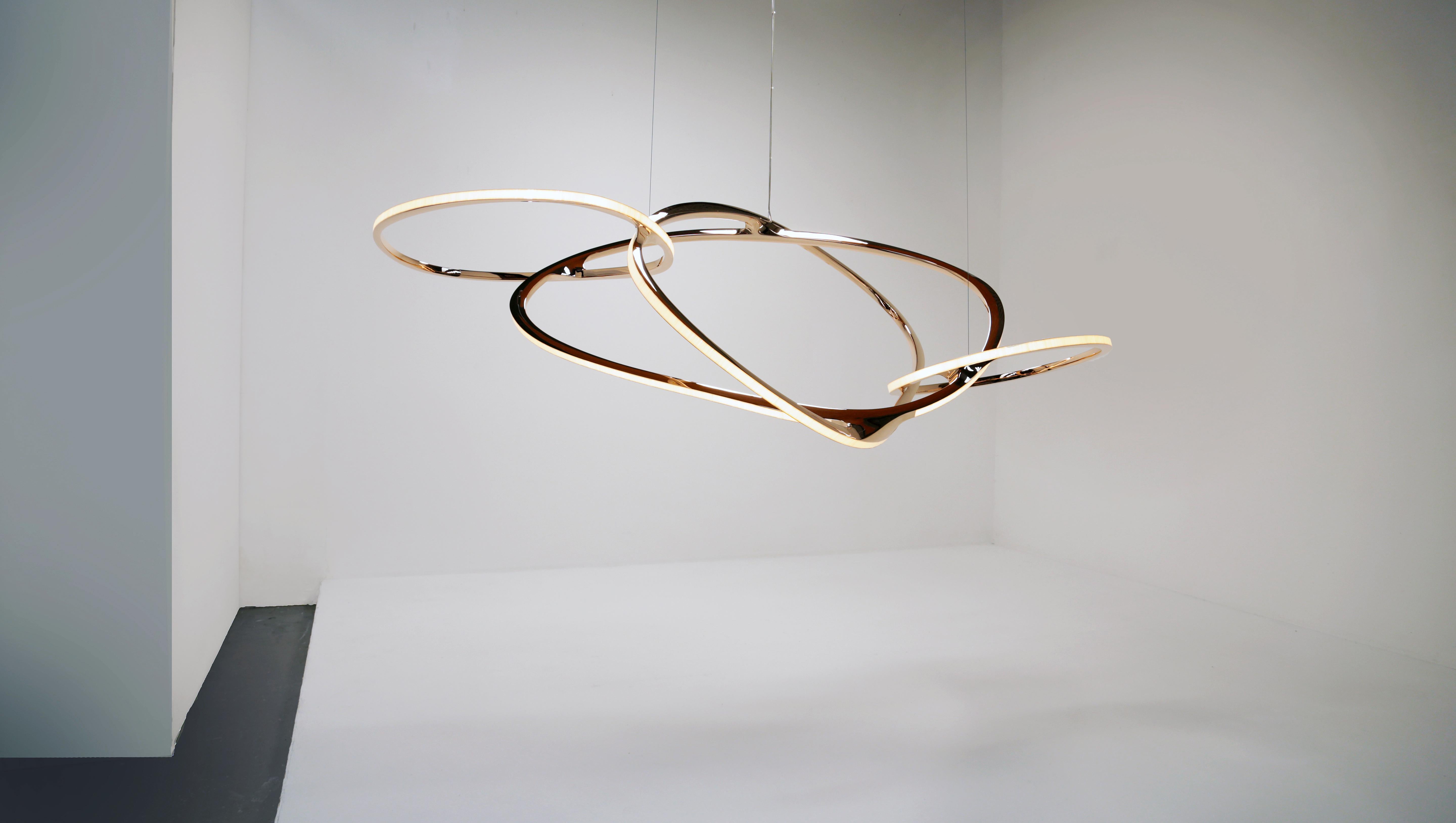 As with the rest of Naimh Barry's work, on it Goes II is inspired by forms and movements in the natural world that evoke emotion. With every element of this new piece, its natural lines, counterbalance of polished metal and light, and arrangement of