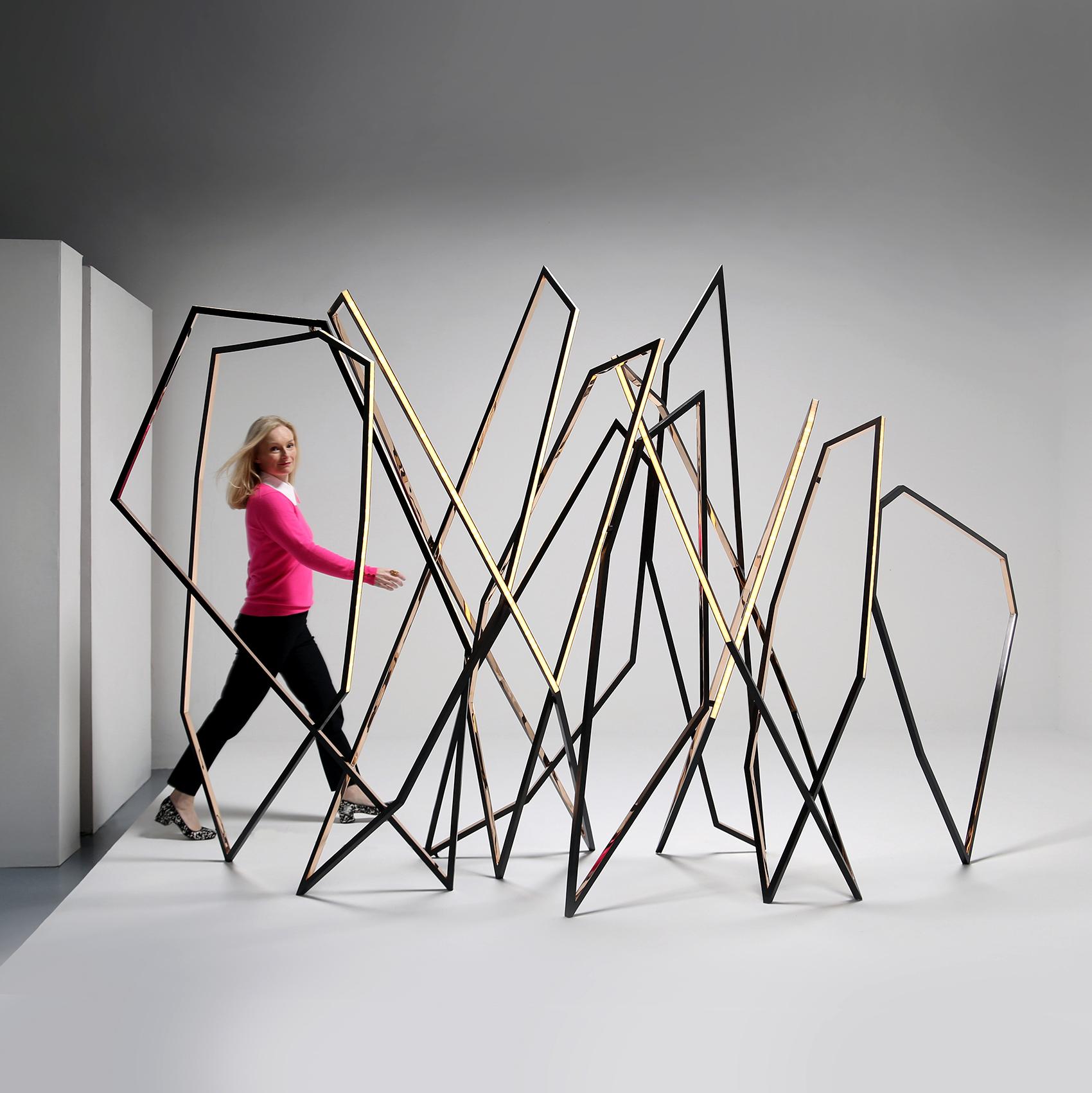 In many of her most powerful sculptures Niamh Barry abandons her signature fluid ellipses for compositions of sharp angles arranged in dynamic, crisscrossing lines-forms that suggest a whole different category of motion. With walking, one of Barry's