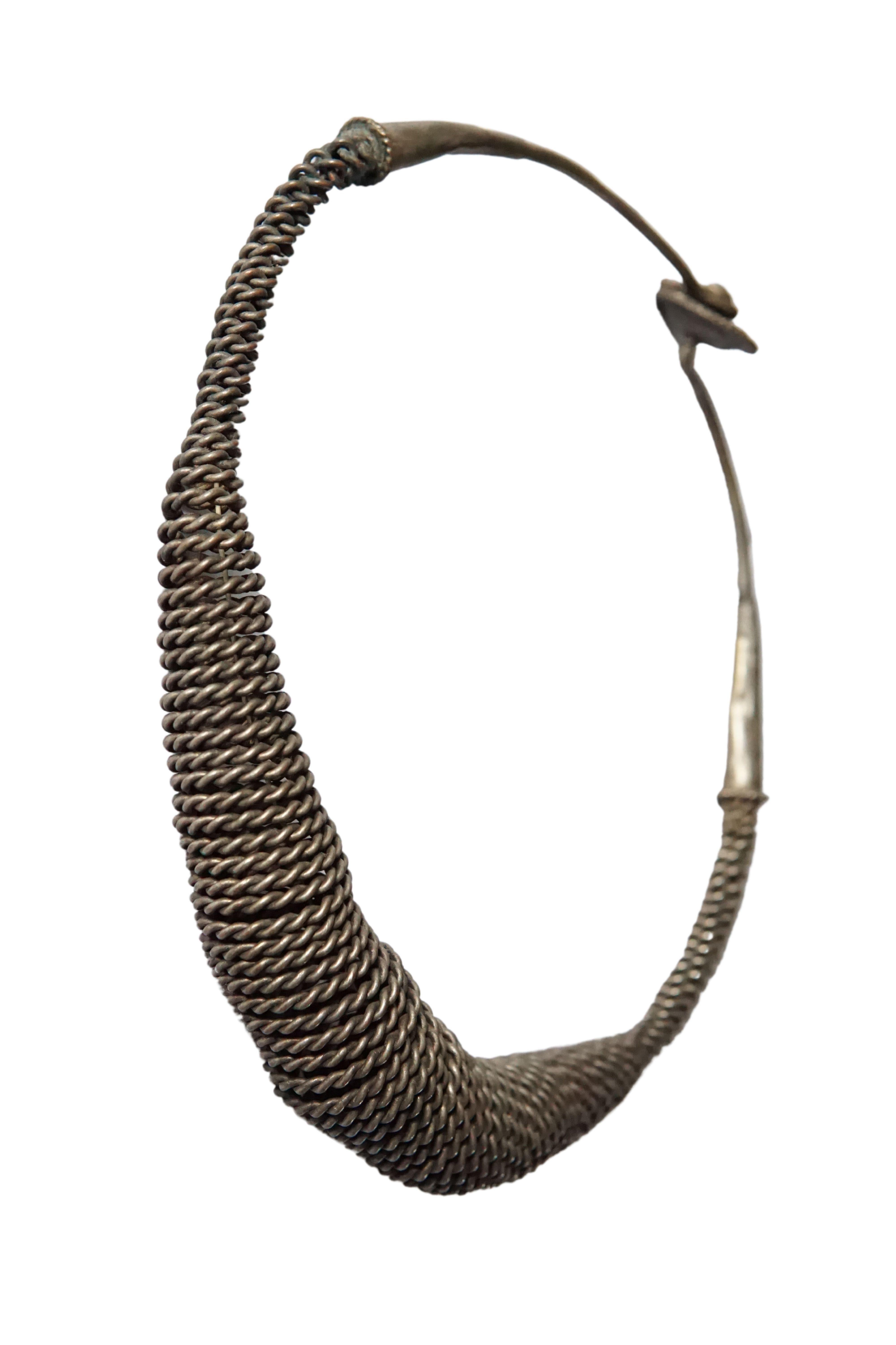 This 'Nifatali-tali' necklace is a type of necklace worn by the people of Northern Nias Island, North Sumatra. This necklace is equally worn by men and women of the noble class, si'ulu. The craftmanship, thickness, as well as composition of the