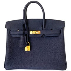 Hermès Birkin 25 Top Handle Bag In Bleu Nuit Togo With Gold Hardware in  Blue