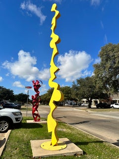 "Vivir juntos, morir libres", Nic Noblique, Escultura grande de acero amarillo, 288x36x36