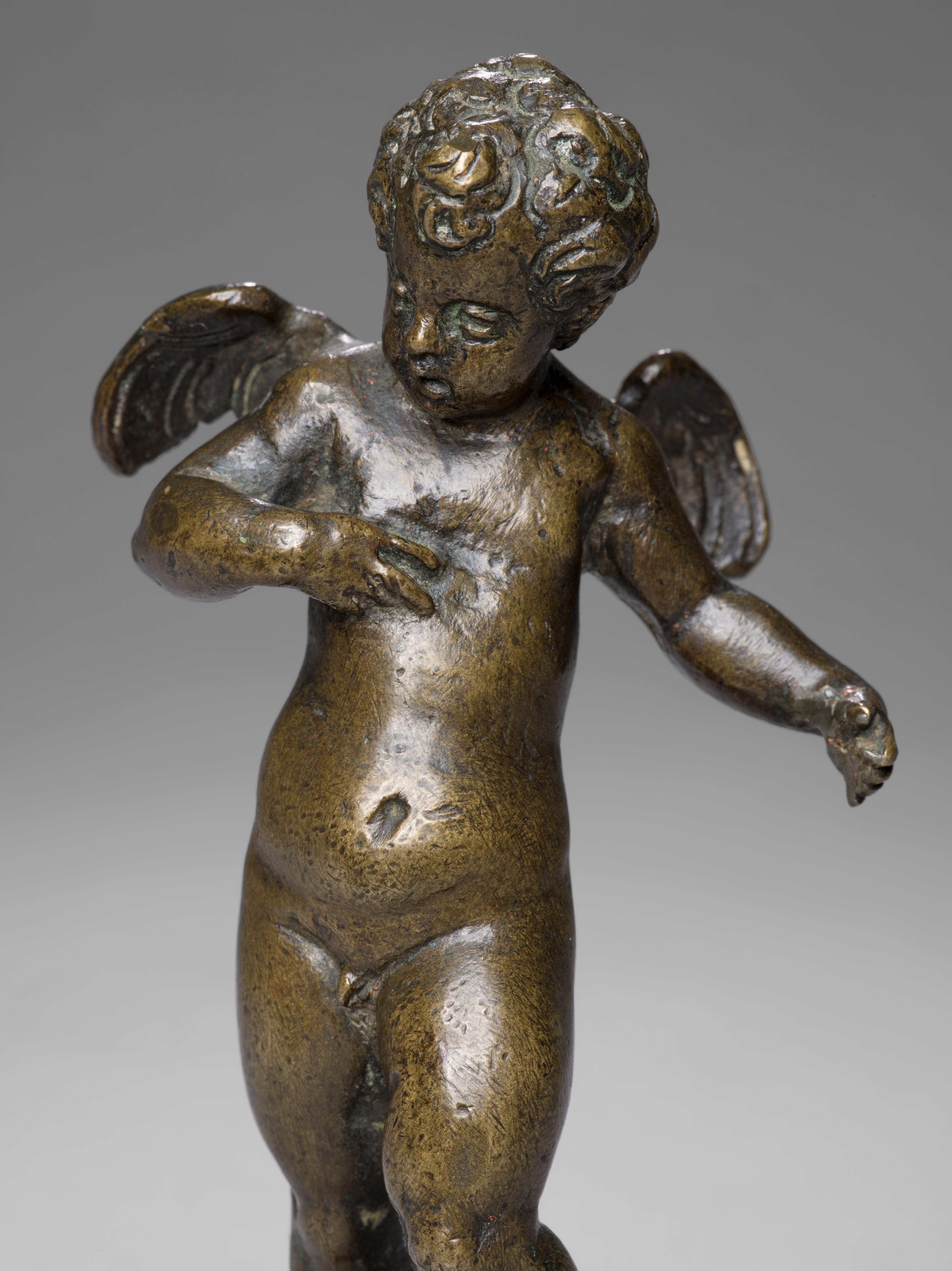 ITALIAN BRONZE FIGURE OF YOUNG CHERUB ON PORPHYRY BASE - ATT. TO ROCCATAGLIATA - Gold Figurative Sculpture by Niccolò Roccatagliata