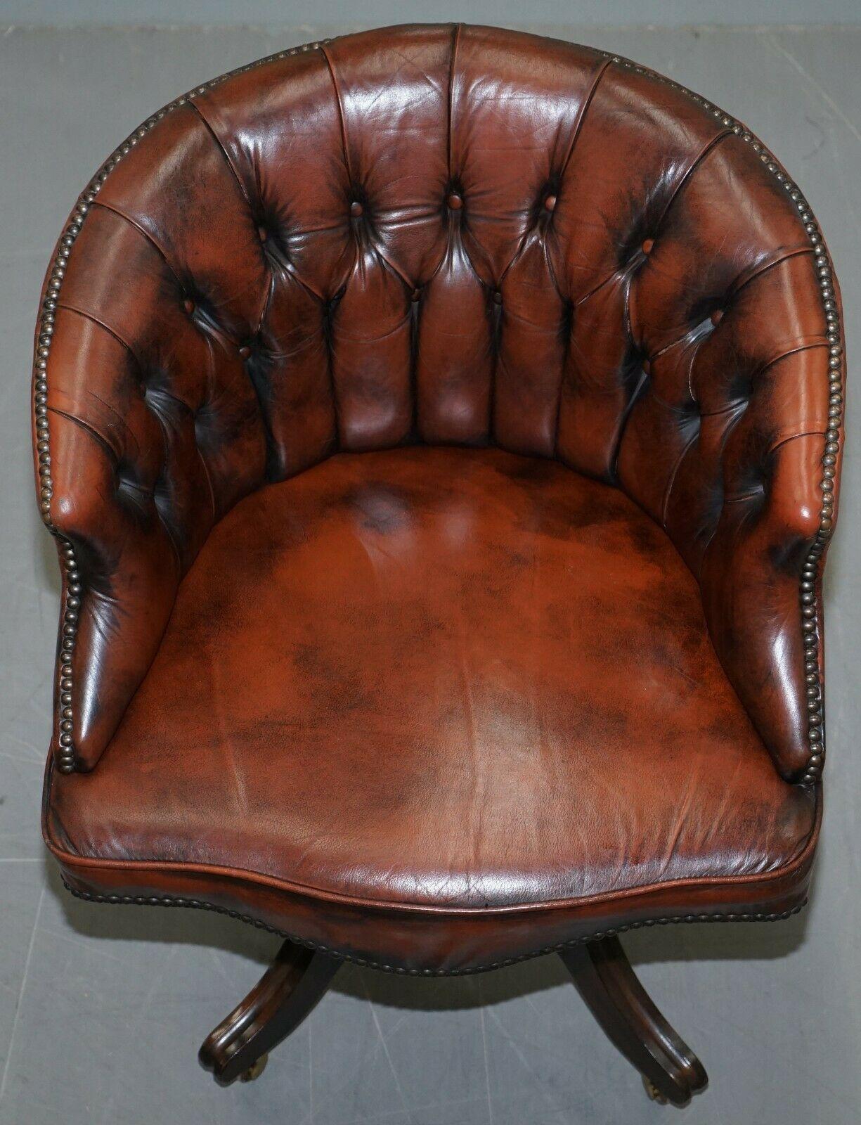 We are delighted to this handmade in England 1967 stamped Chesterfield hand dyed brown leather curved back captains chair

This chair is one of a pair, the other is listed under my other items, the only difference is this has a large metal dome on