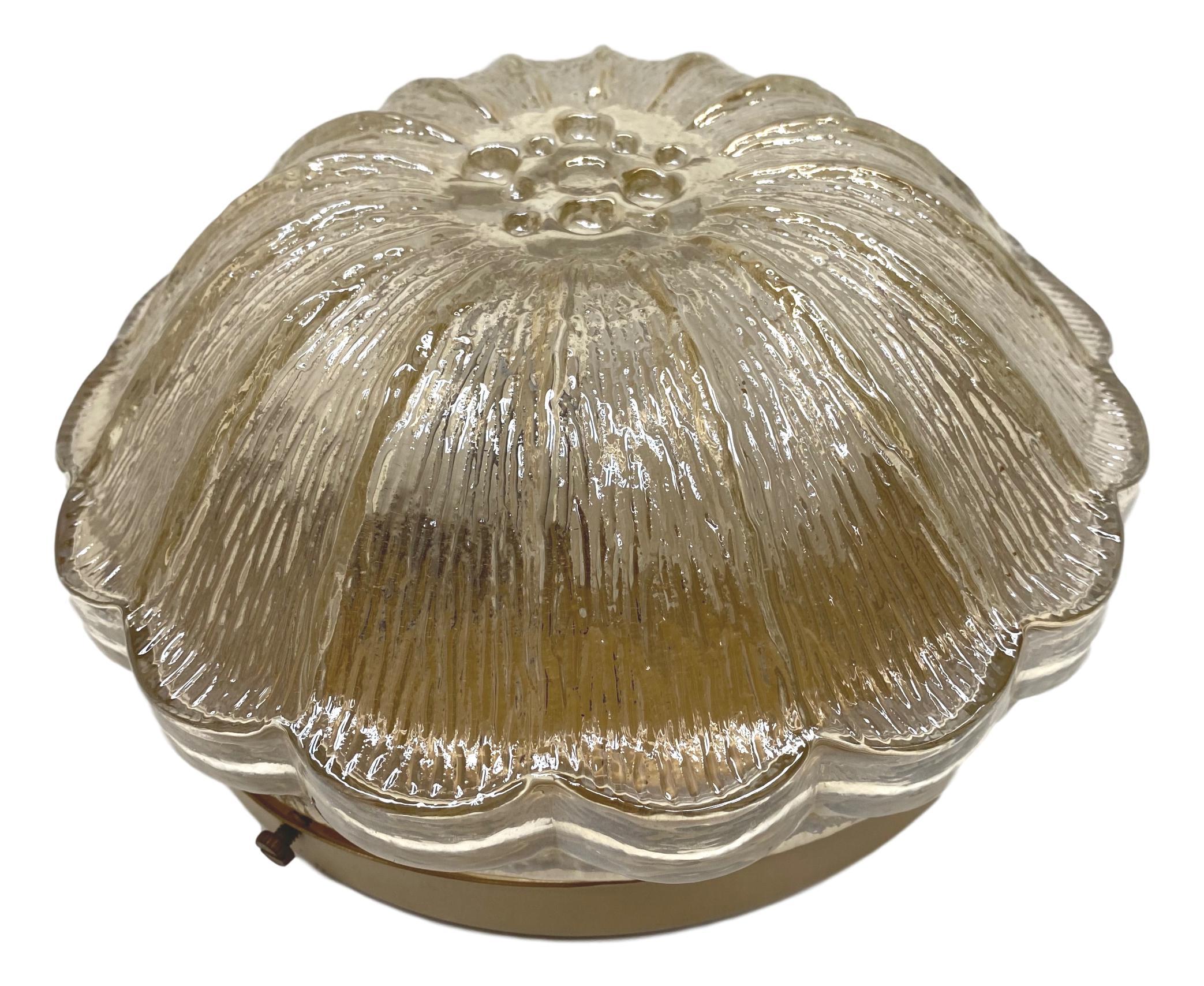 Beautiful flower shape flush mount. Made in Germany in the 1960s. Gorgeous textured glass flush mount with metal fixture. The Glass has a very cute design. The fixture requires one European E27 / 110 Volt Edison bulb, up to 60 watts.