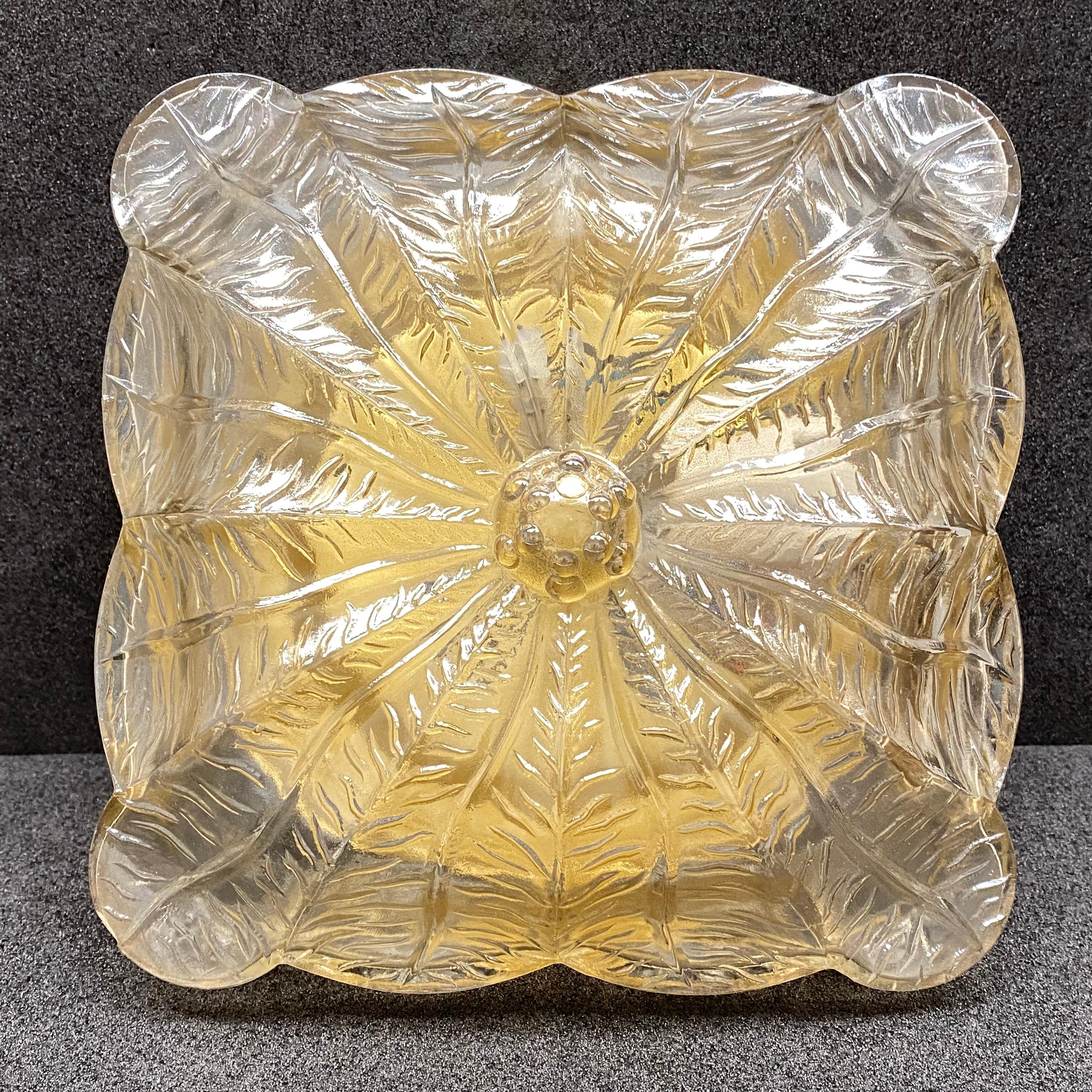 Beautiful leaf shape flush mount. Made in Germany in the 1960s. Gorgeous textured glass flush mount with metal fixture. The glass has a very cute design. The fixture requires one European E27 / 110 Volt Edison bulb, up to 60 watts.