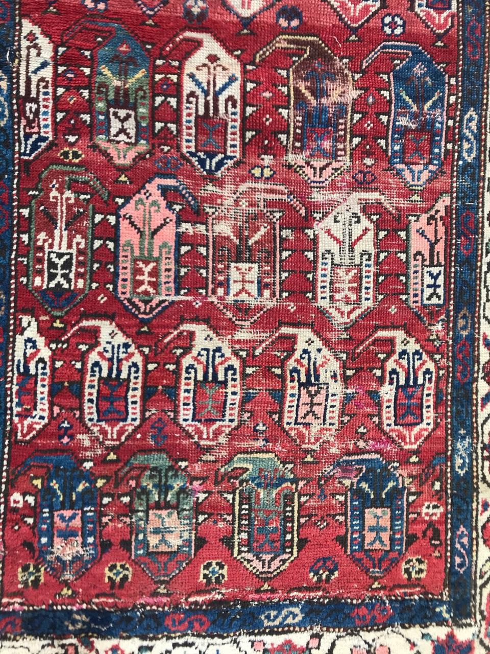 Beautiful late 19th century Kazak rug with a botteh design and natural colors with red and blue, entirely hand knotted with wool velvet on wool foundation.