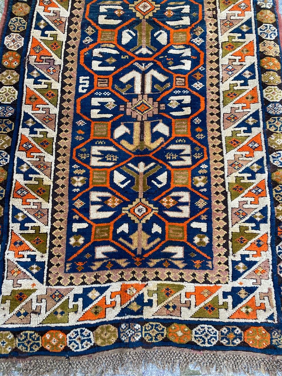 Beautiful Kazak rug with nice geometrical design and beautiful colors with orange, green, yellow, purple and blue, entirely hand knotted with wool velvet on wool foundation.

✨✨✨
