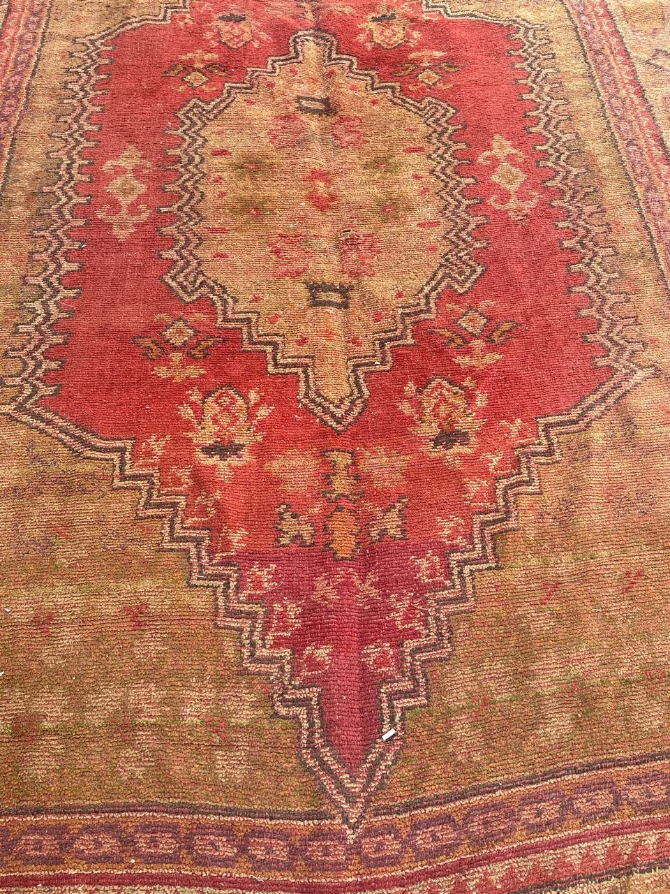 Beautiful early 20th century large European rug with a design of the antique Turkish oushak rugs and nice colours with a red background and green, purple, brown, yellow and white, entirely hand made by a special method and with a double sided.
Some