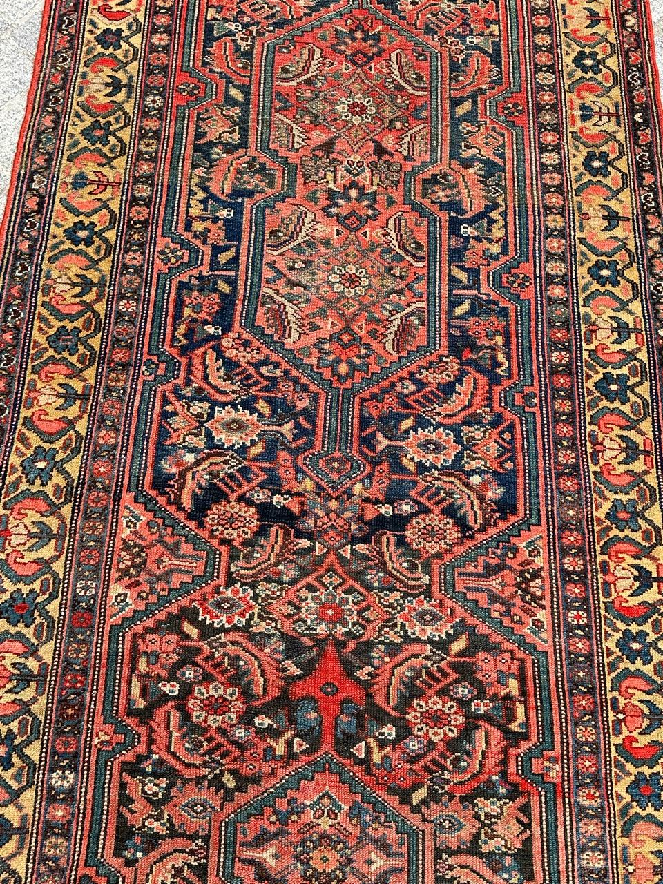 Very beautiful late 19th century malayer runner with a beautiful large herati design with stylized designs inside a geometrical design and nice natural colours with a dark blue field, red, green, yellow, blue grey and white. Entirely and finely hand