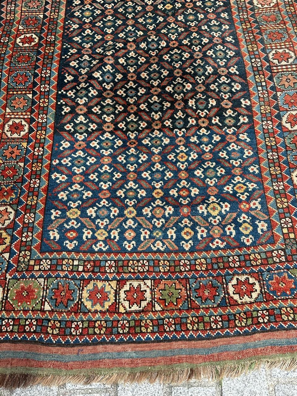 Very beautiful antique Kurdish rug with nice geometrical and tribal design and nice natural colours with a navy blue field, red orange, pink, green, yellow, blue and white, entirely hand knotted with wool on wool foundation 

✨✨✨
