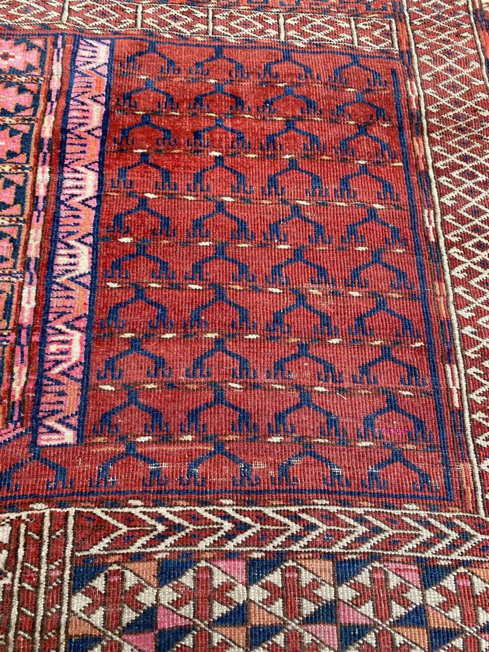 Beautiful late 19th century fine Turkmen rug with a geometrical and tribal design and nice natural colors, entirely and finely hand knotted with wool velvet on wool foundation.