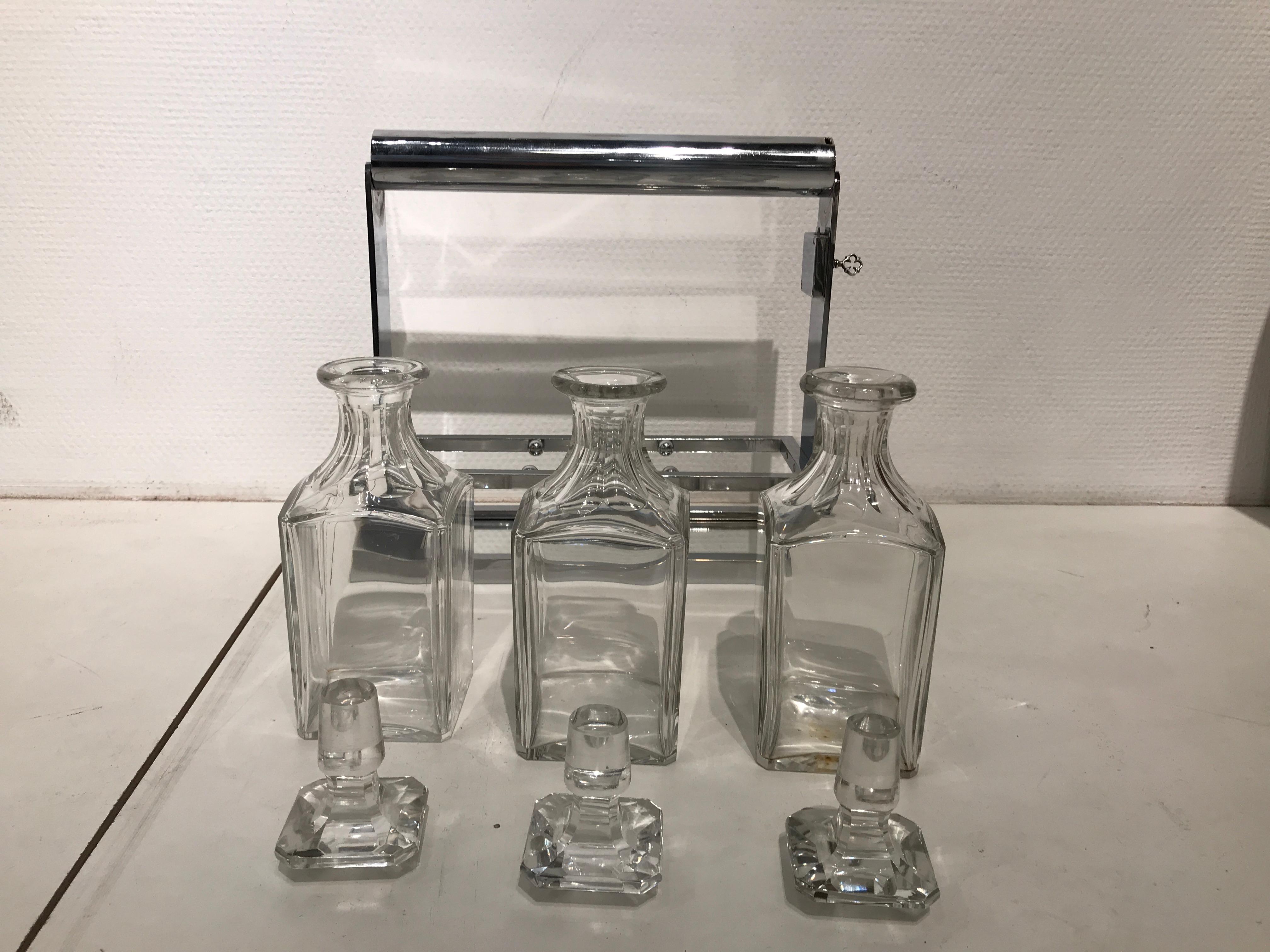 Nice Baccarat Crystal and Jacques Adnet Liquor Bottles Set In Excellent Condition For Sale In Brussels, BE