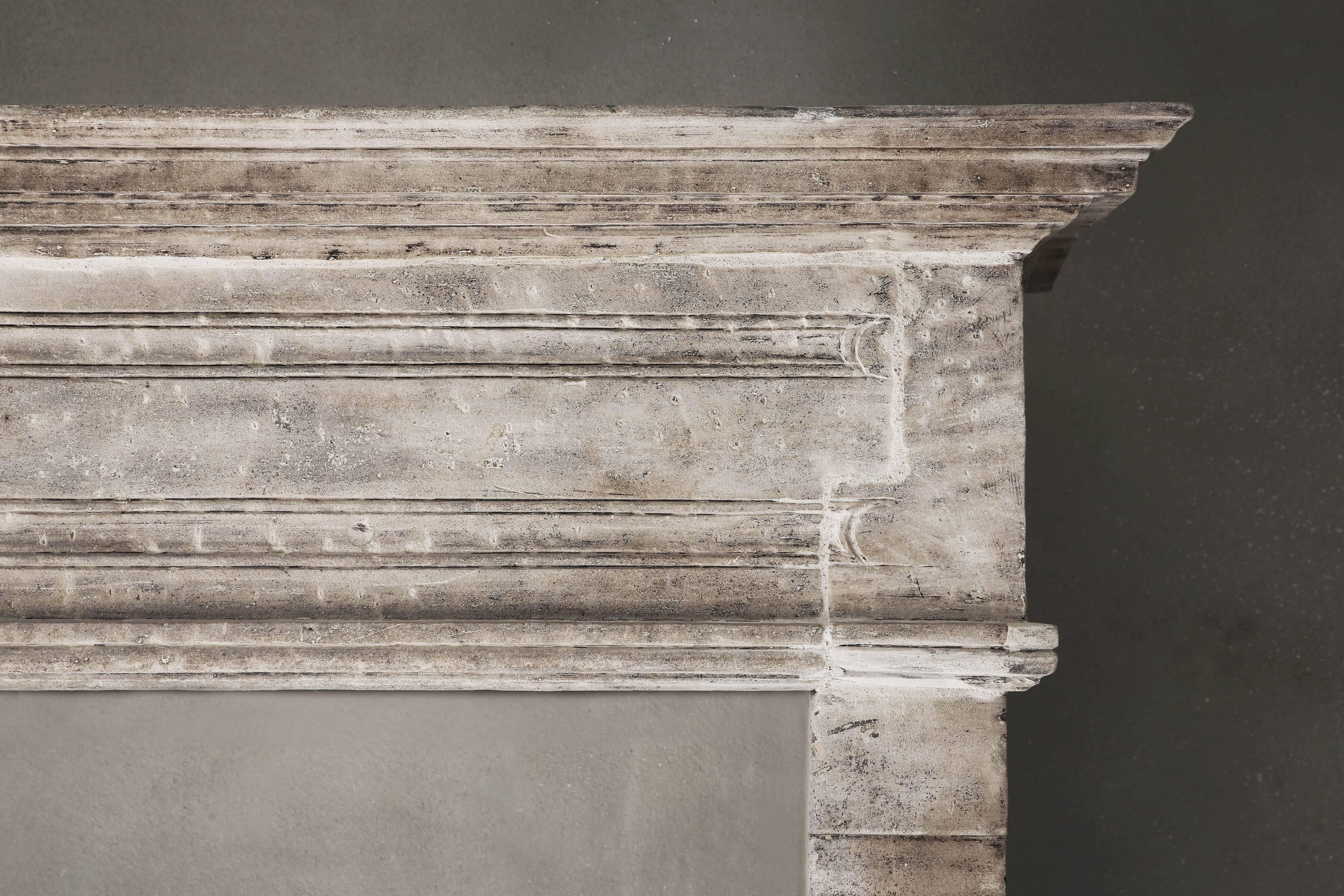 Recently we took this stately rugged French limestone castle chimney from an old monastery in the middle of France. This stately fireplace has a wide front section with beautiful lines that makes the chimney graceful. The look that this fireplace