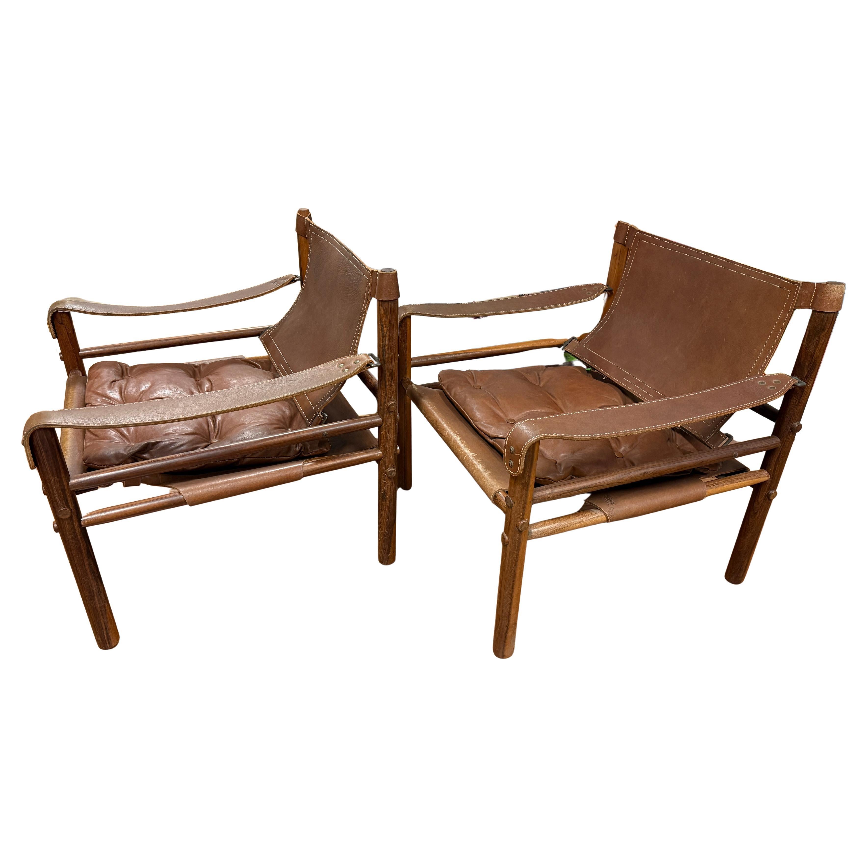 Bonito y limpio par de sillas Sirocco Arne Norell de los años 70 en cuero marrón y palisandro en venta