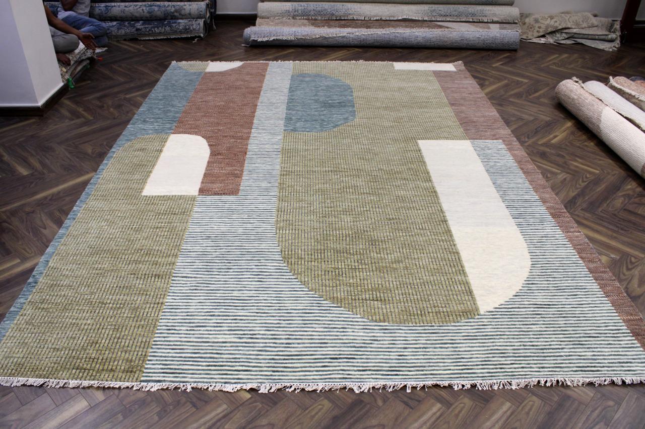 Pretty new modern design rug with nice geometrical art deco style design and beautiful colors, entirely hand knotted with wool velvet on cotton foundation.