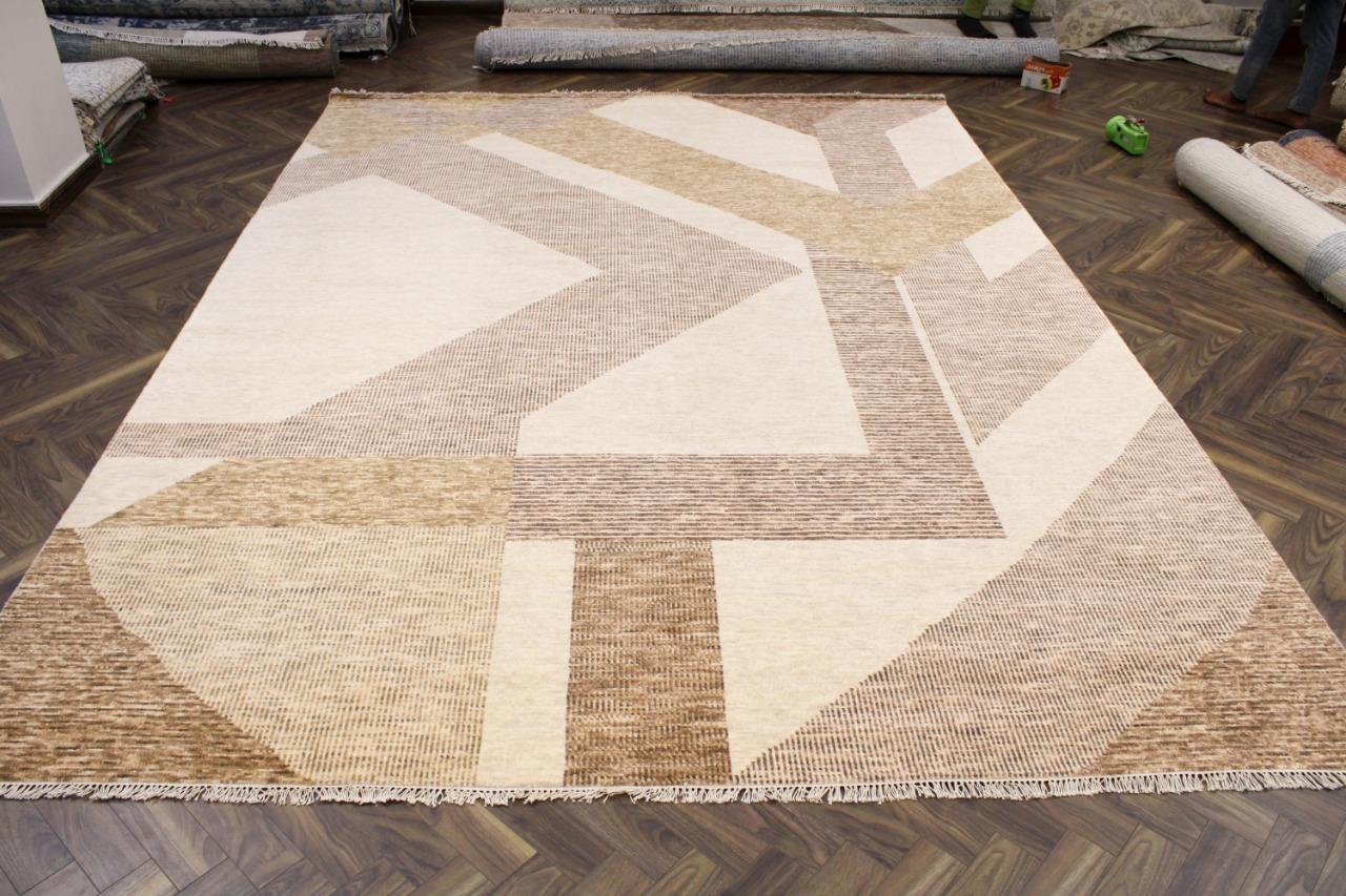 Pretty new modern design rug with nice geometrical Art Deco style design and beautiful colors, entirely hand knotted with wool velvet on cotton foundation.