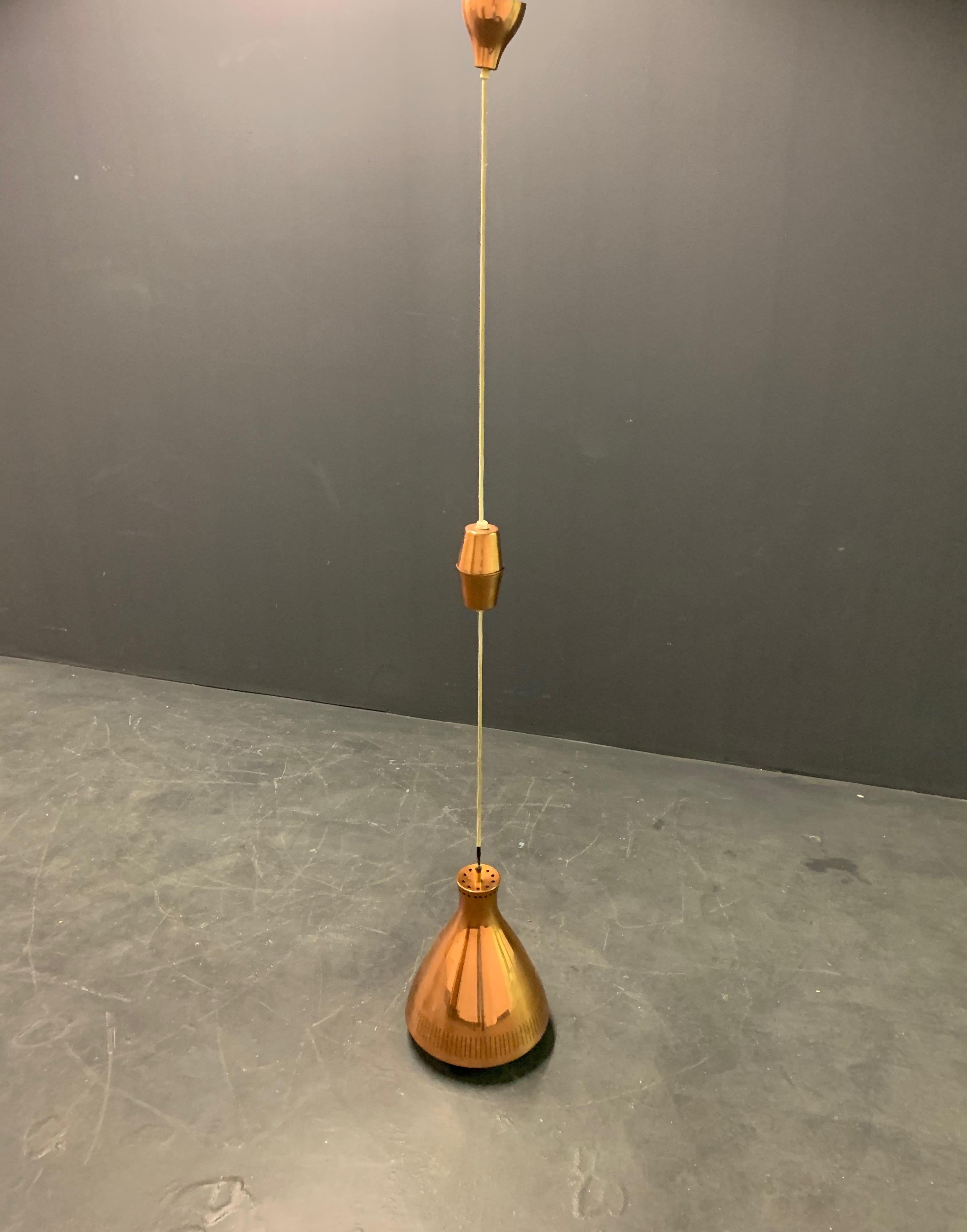 Nice copper ceiling lamp attributed to Paavo Tynell, high adjustable.