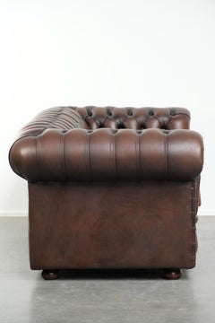 Nice cow leather Chesterfield 2-seater sofa in English style