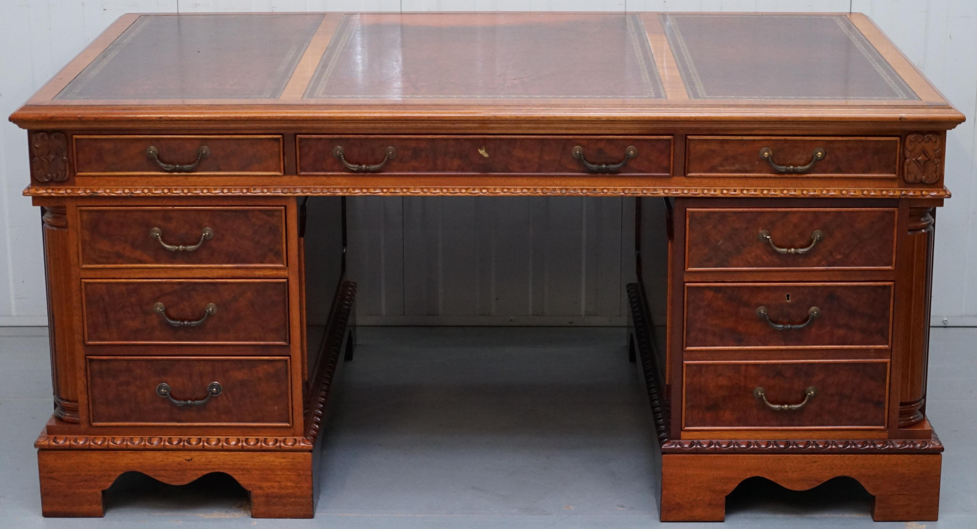 We delighted to offer for sale this stunning burr and flamed walnut large 16 drawer double sided twin pedestal partner desk for two people to share

A very heavy well made luxury twin partner desk, based on the original idea of two legal partners