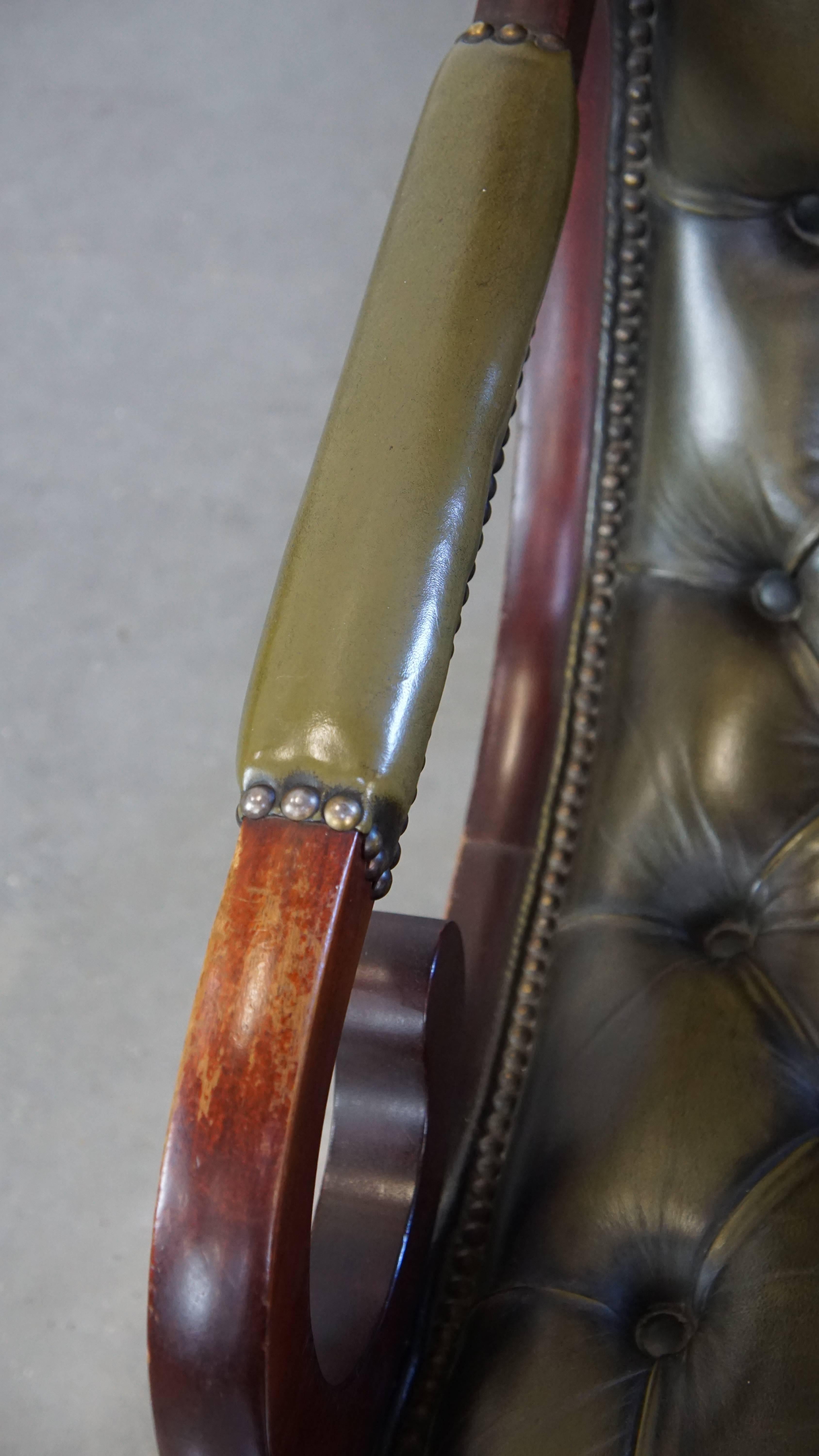 Cowhide Nice, elegant green cowhide leather chesterfield armchair combined with wood For Sale