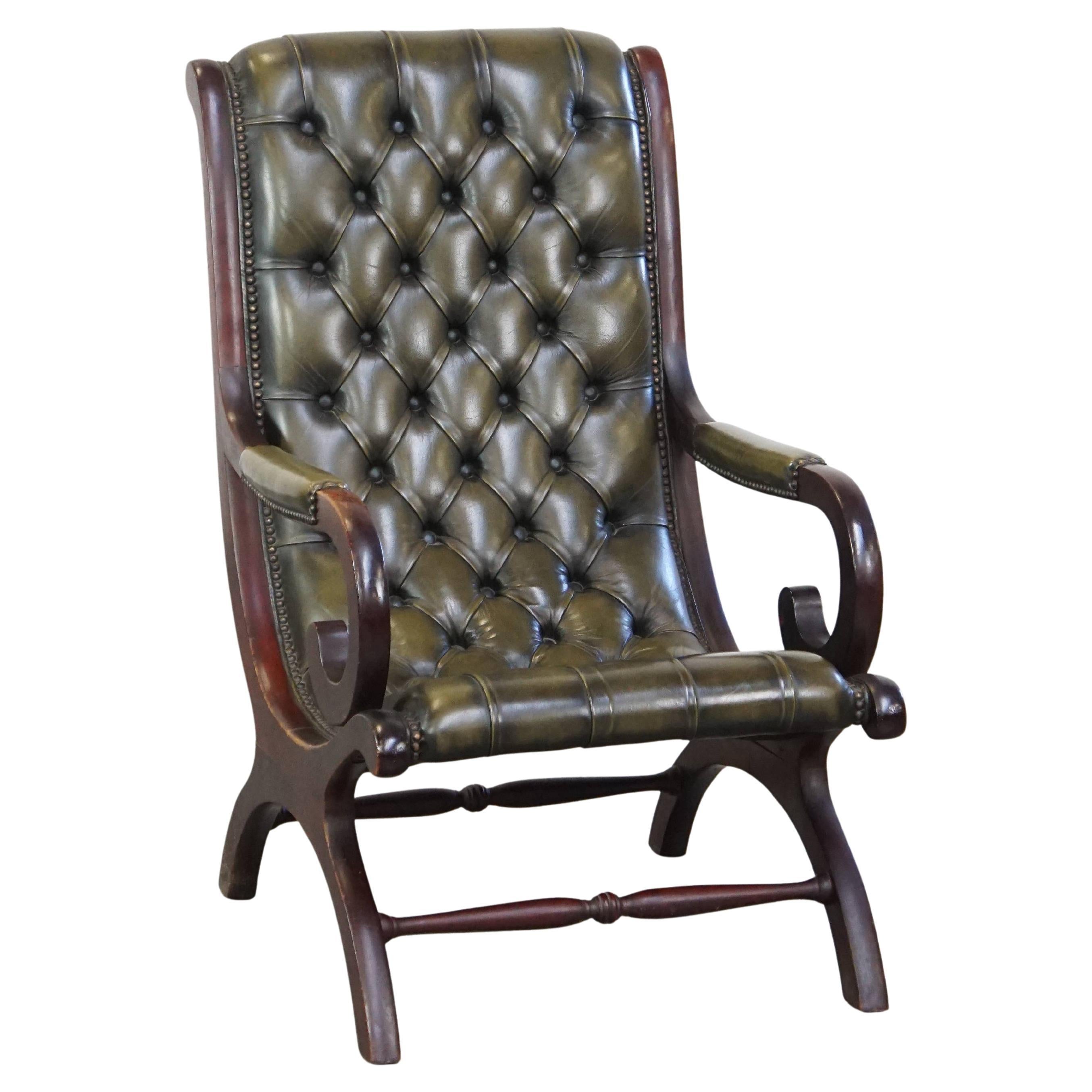 Nice, elegant green cowhide leather chesterfield armchair combined with wood
