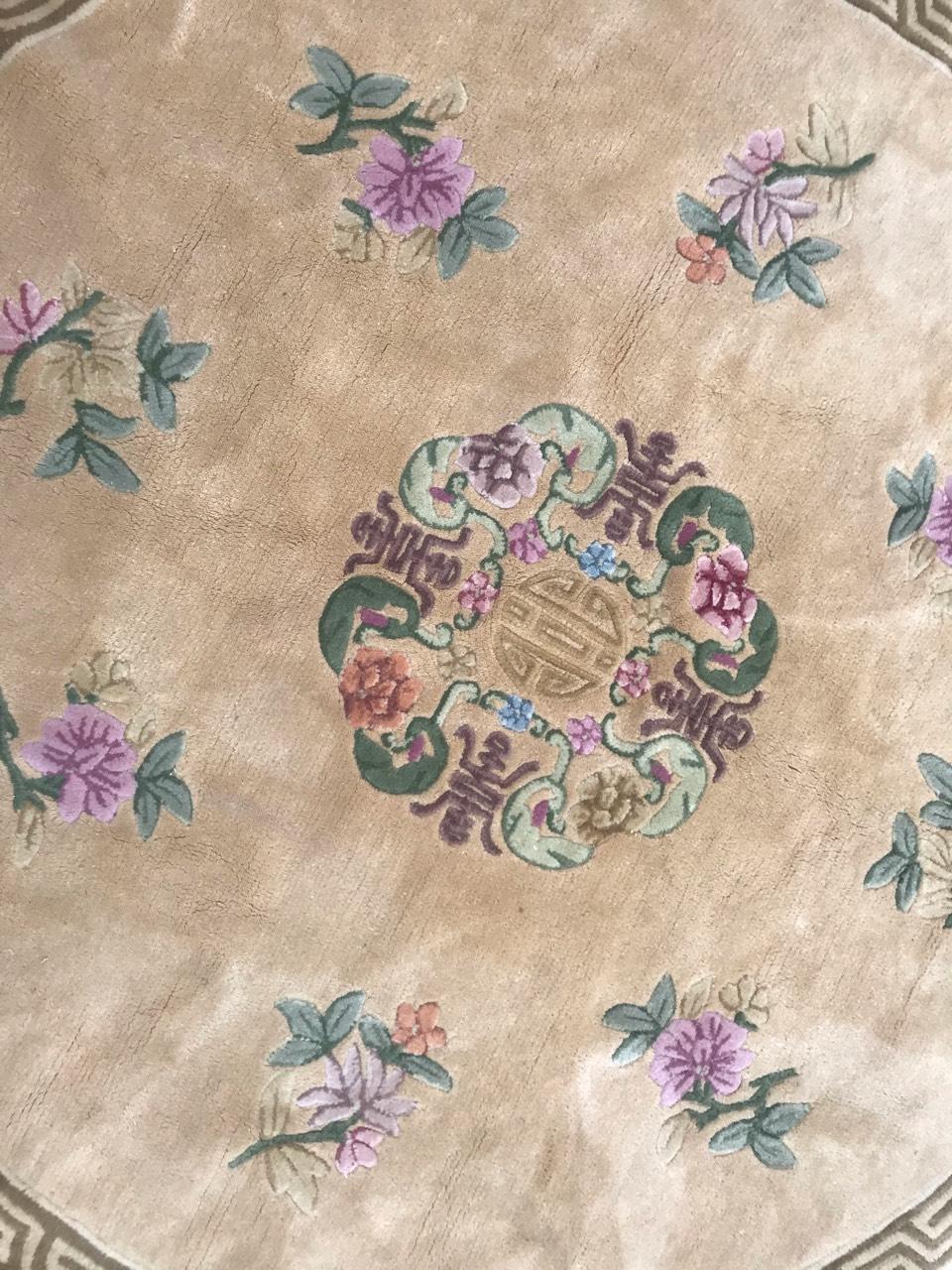 Beautiful Chinese rug with a and nice Chinese design, and beautiful colors with a yellow field, pink, green, orange and blue, entirely hand tufted with wool velvet on cotton foundation.