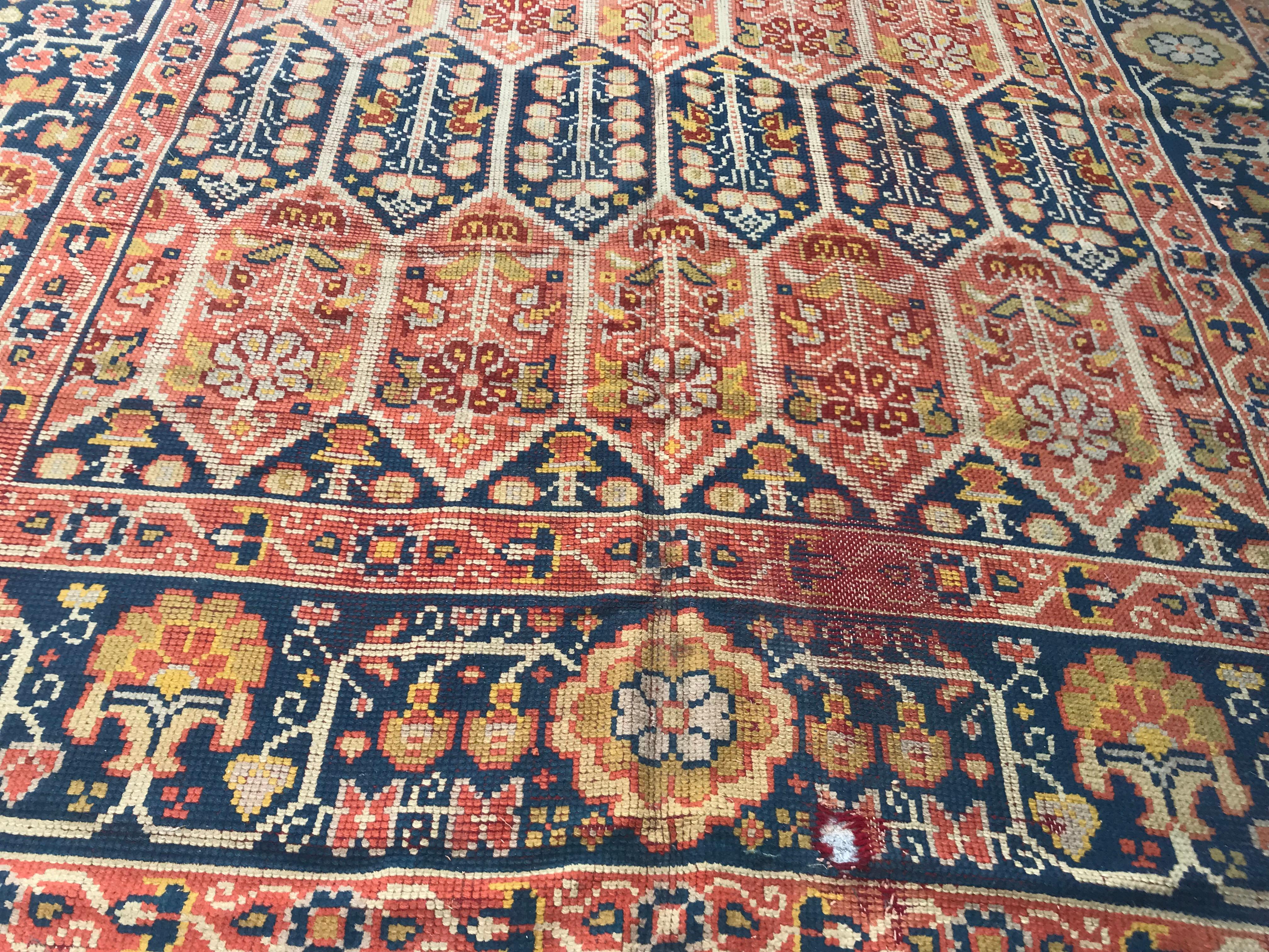 Beautiful large antique European rug, Donegal, late 19th century, with nice patterns and in style of Persian bakhshaish rugs, entirely hand knotted with wool velvet on cotton foundation, some damages and wears.

 