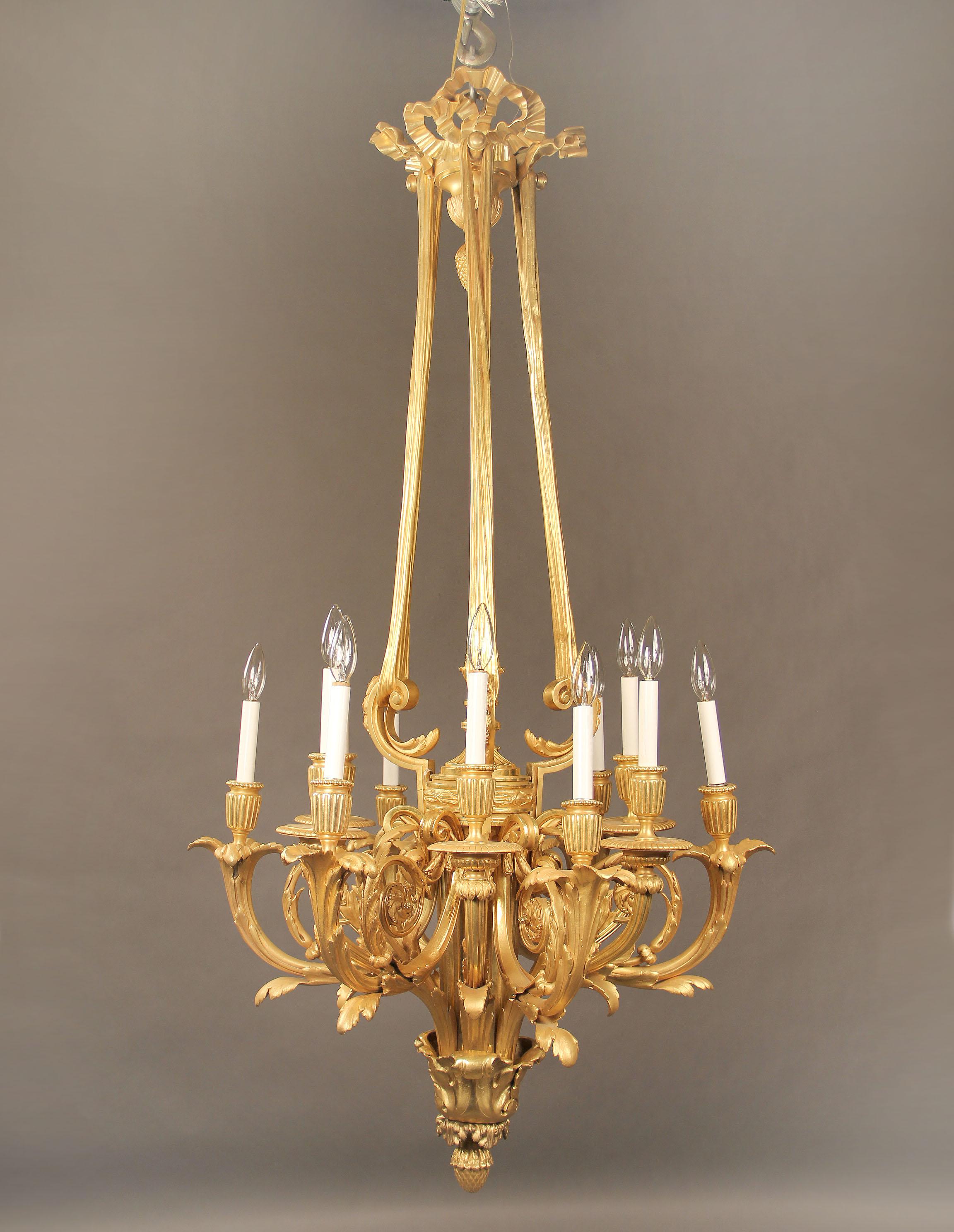 A nice late 19th century gilt bronze twelve-light chandelier.

A long narrow body with 