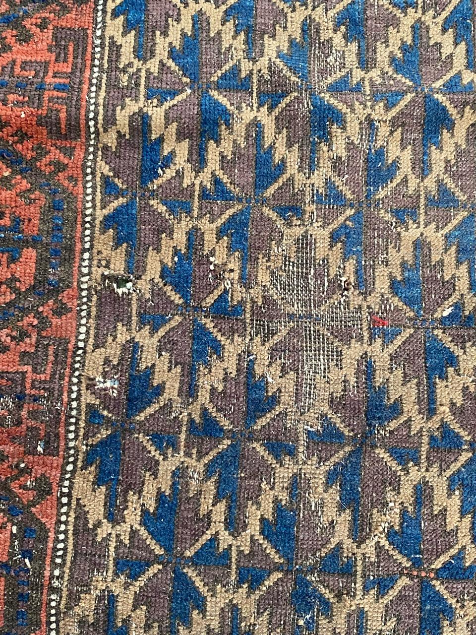 19th Century Bobyrug’s Nice Little Antique Distressed Baluch Rug For Sale