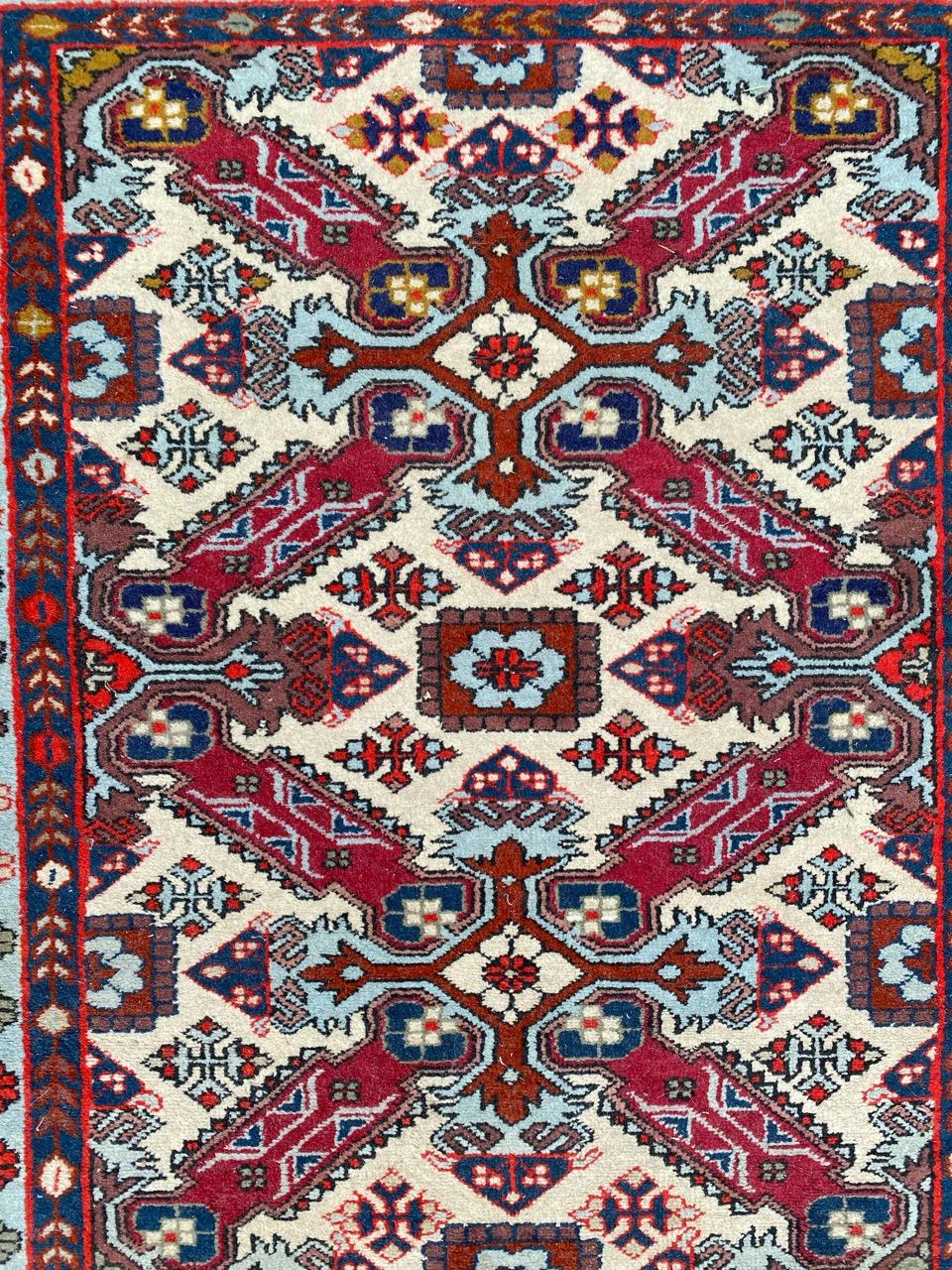 Very beautiful little rug with a Caucasian design and beautiful colors, entirely hand knotted with wool velvet on cotton foundation.