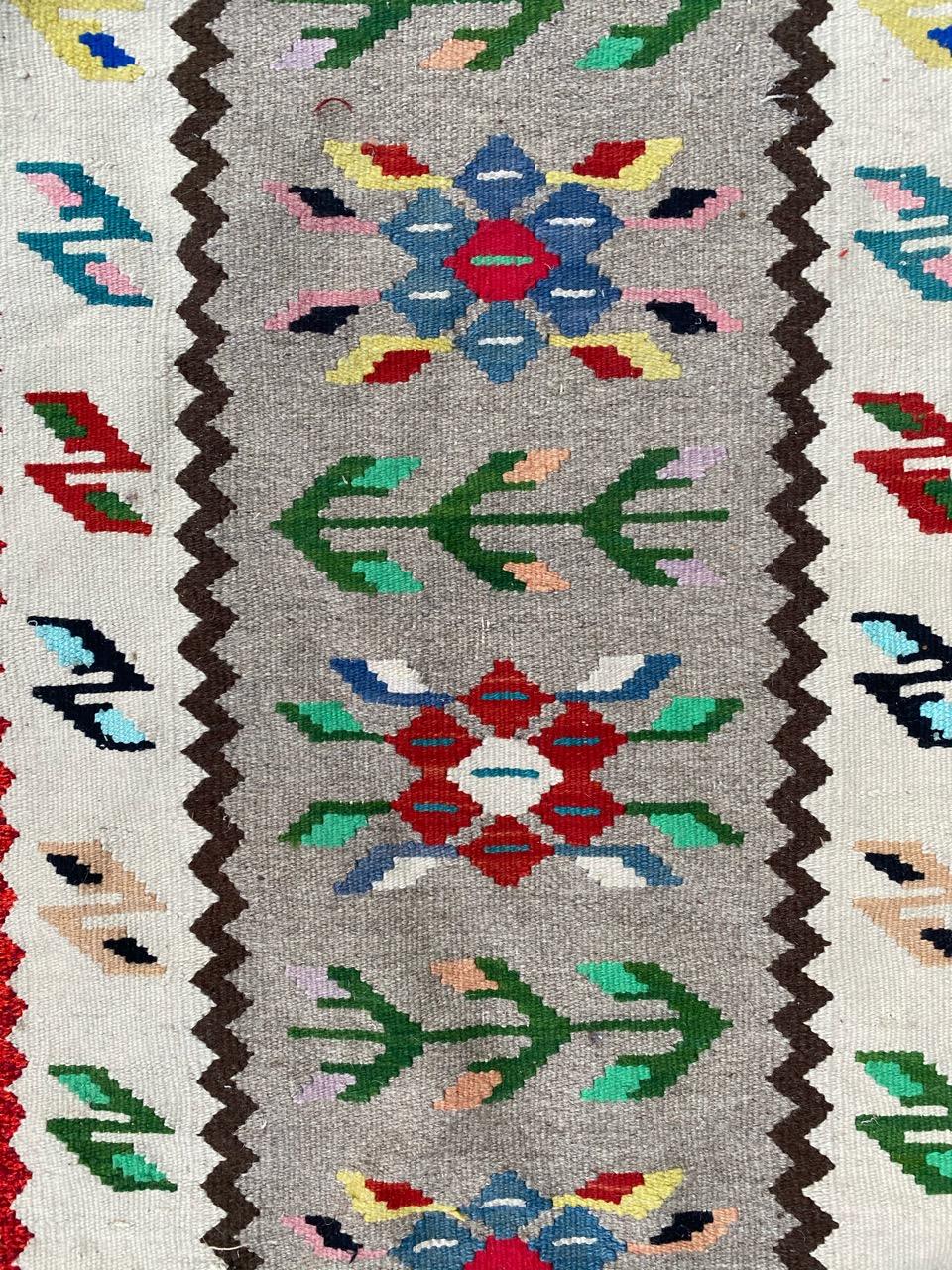Beautiful little Kilim with a geometrical design and nice colors, entirely handwoven with wool on cotton.