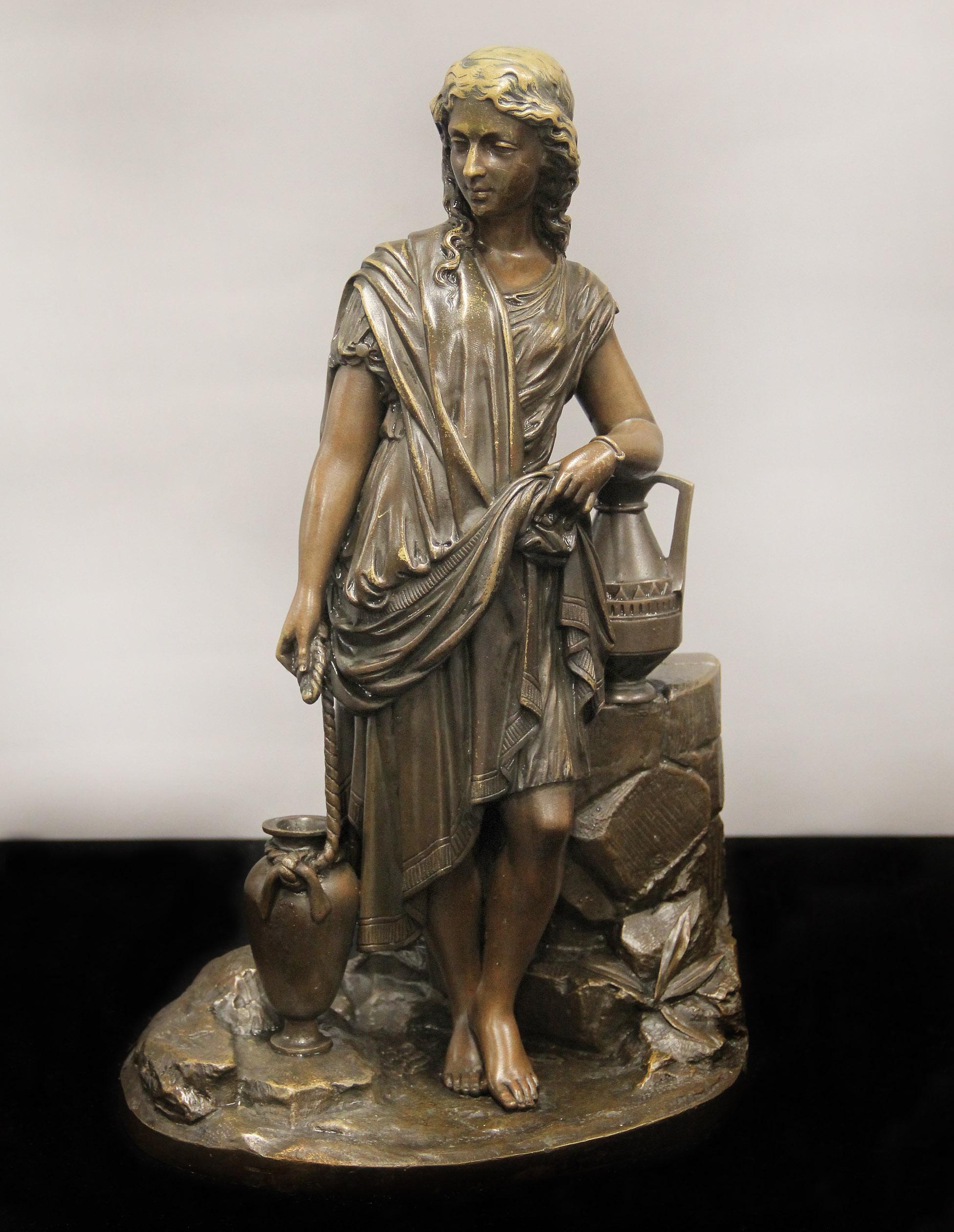 Bella figura di donna in bronzo patinato della metà del XIX secolo, fusa da Alfred Daubrée

Attribuito a Charles Cumberworth e lanciato da Alfred Daubrée

Raffigura una bella donna in abito da sera che raccoglie l'acqua in un pozzo.

Timbro Daubree