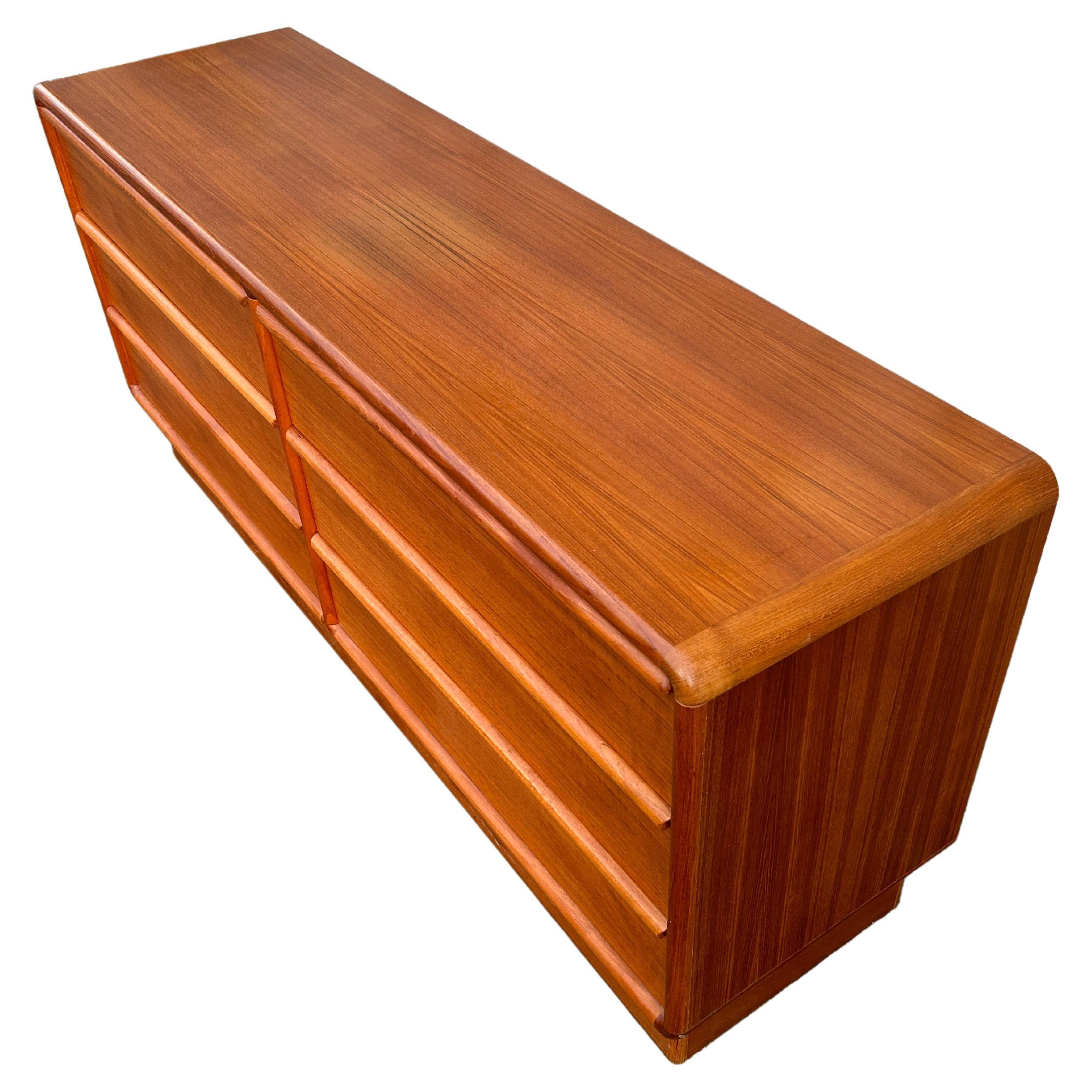 midcentury Danish Modern 6 drawer rounded teak dresser or credenza by Kibaek Mobler. Beautiful rounded teak with a nice grain. All drawers clean inside and out as well as slide smooth on drawer tracks. Simple symmetric design - Very clean. Shows