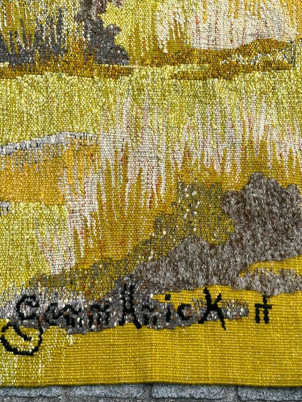 Discover the elegance of modern French tapestry with the exquisite design titled «bocage» by Gemmanick. This limited edition masterpiece, woven in vibrant shades yellow,  green, blue, orange , brown and white, adds a touch of sophistication to any