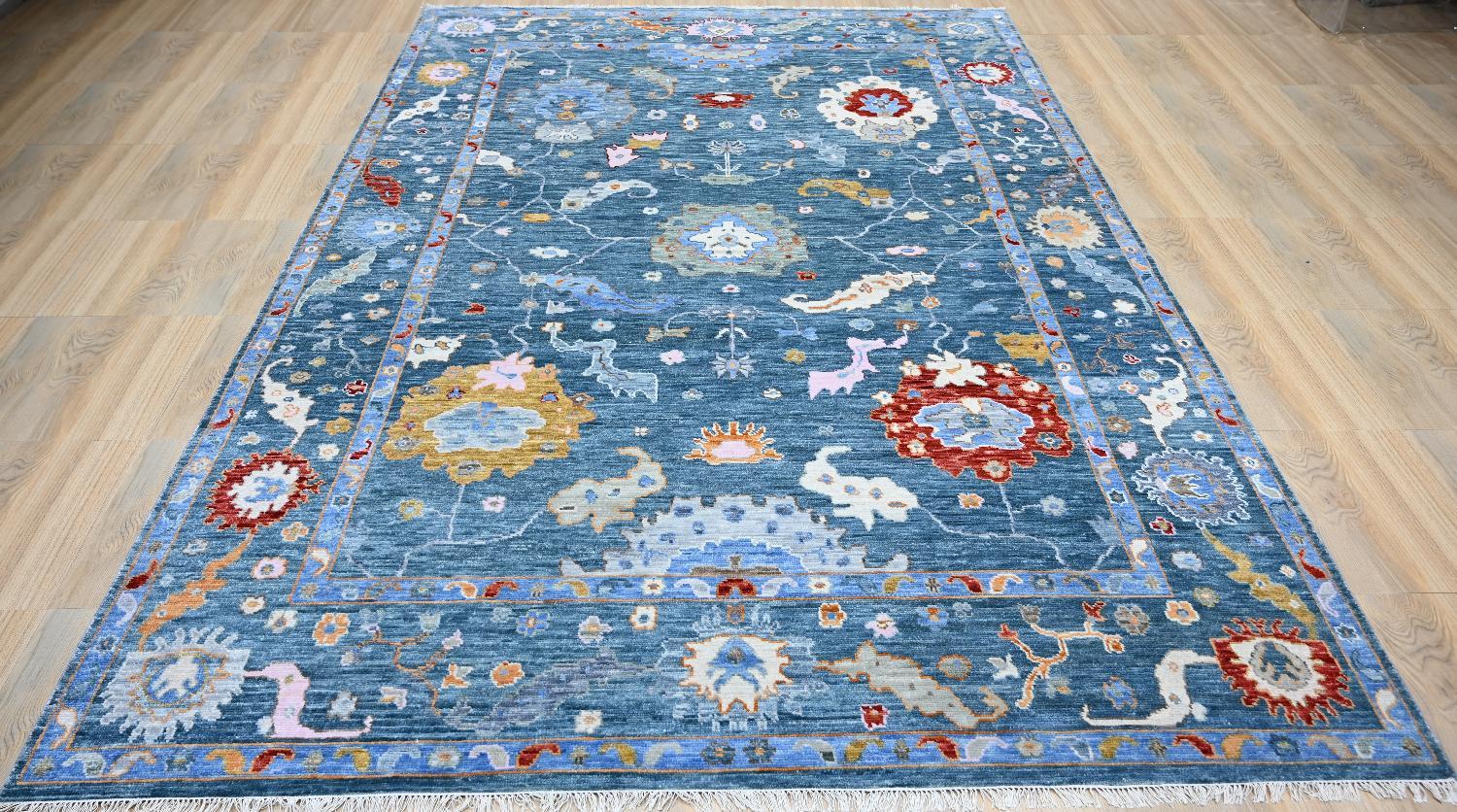 Nice new rug with beautiful Oushak design and nice colors, entirely hand knotted with wool velvet on cotton foundation.