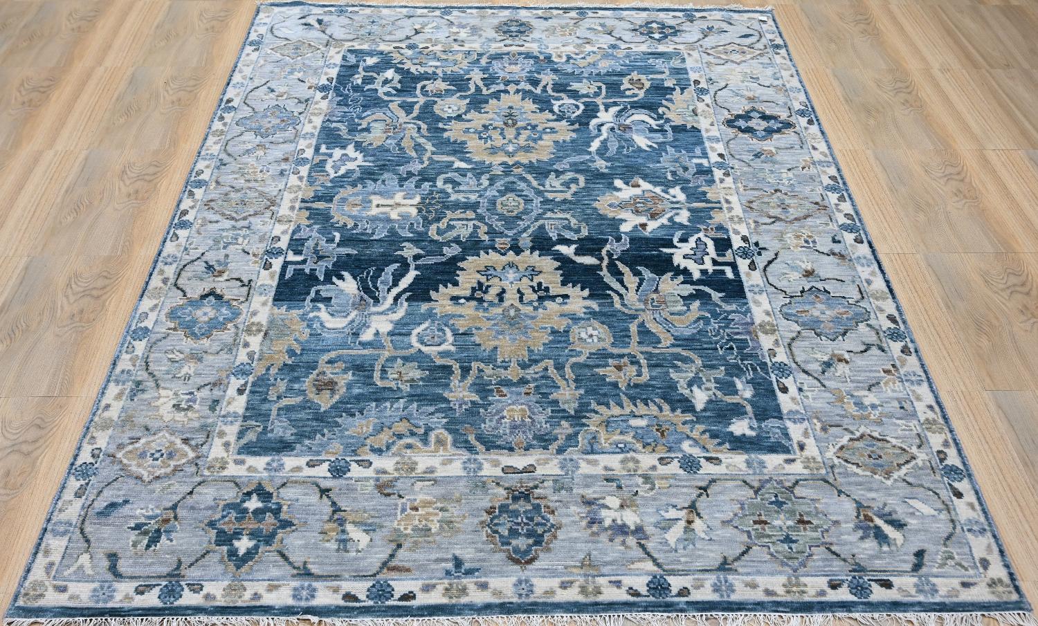 Introducing our model of exquisite new rug featuring a stunning Oushak design and delightful color palette. Entirely hand-knotted with precision, it boasts a luxurious blend of wool velvet on a cotton foundation. Elevate your space with this elegant