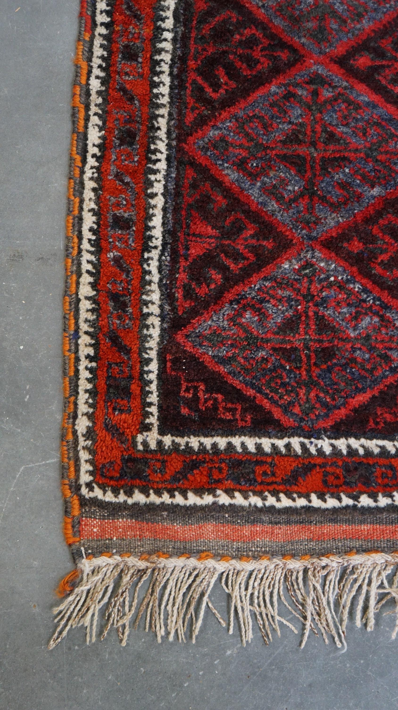 Nice oriental rug in mainly red and gray tones and a beautiful motif 150x100cm In Fair Condition For Sale In Harderwijk, NL