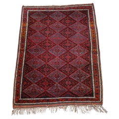 Nice oriental rug in mainly red and gray tones and a beautiful motif 150x100cm
